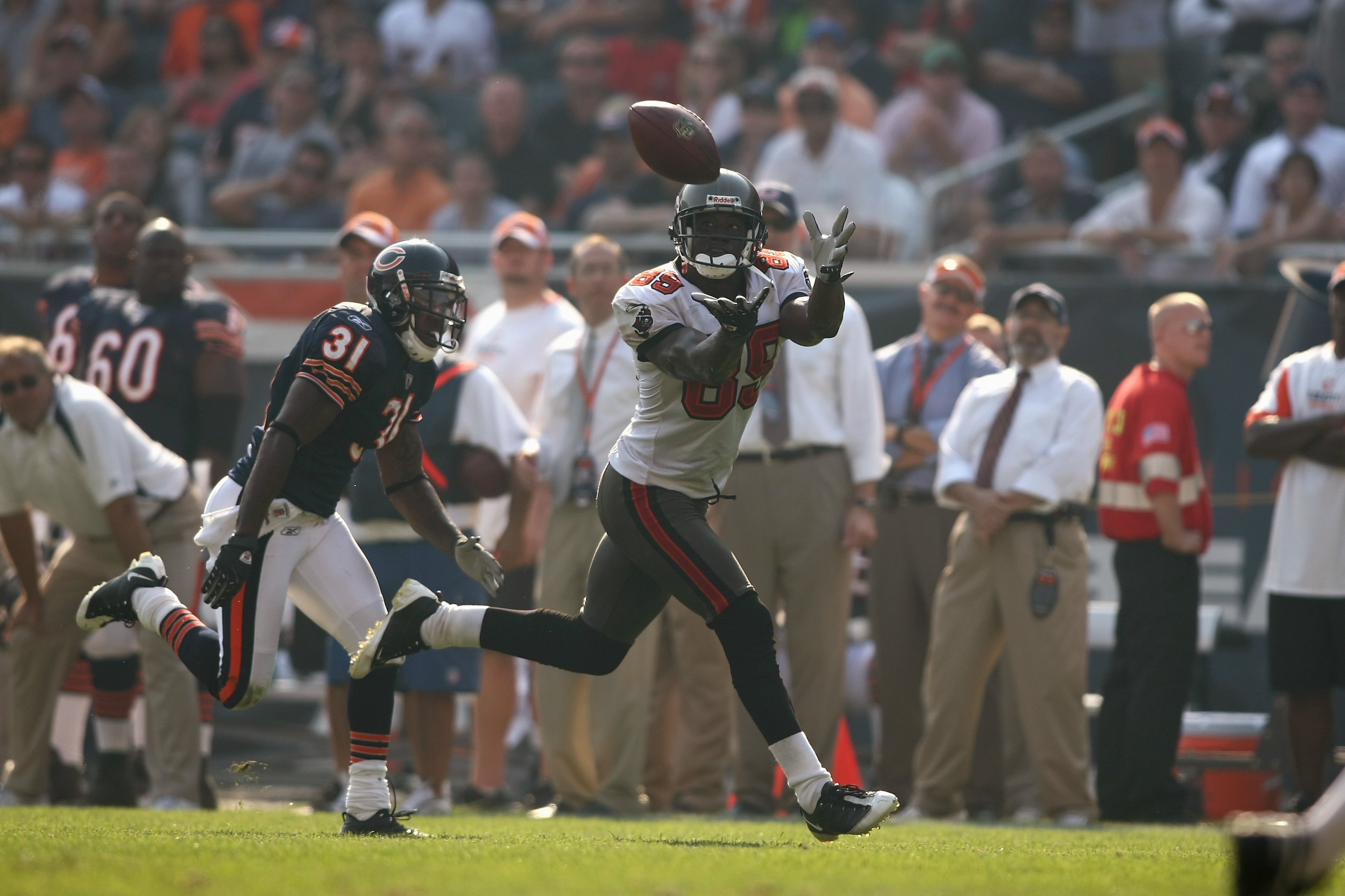 CHICAGO - SEPTEMBER 21:  Antonio Bryant #89 of the Tampa Bay Buccaneers catches the ball against Nathan Vasher #31 of the Chicago Bears at Soldier Field on September 21, 2008 in Chicago, Illinois. The Buccaneers won 27-24 in OT. (Photo by Jonathan Ferrey/