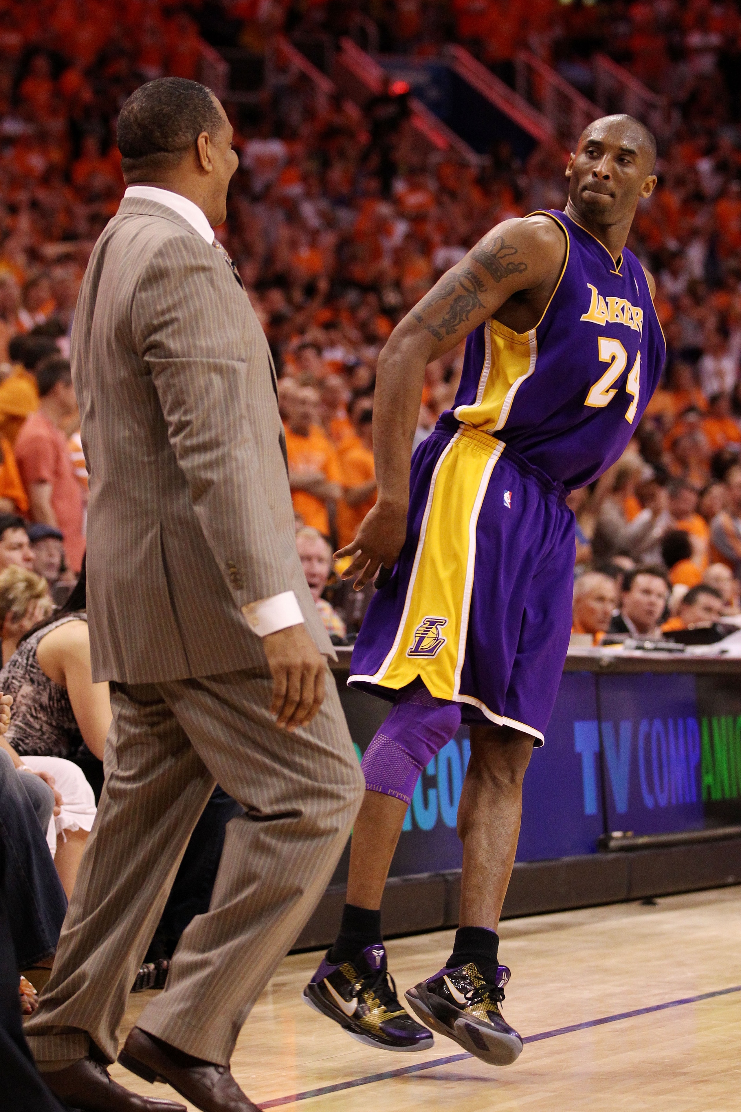 PHOENIX - MAY 29: Kobe Bryant #24 of the Los Angeles Lakers looks at head coach Alvin Gentry of the Phoenix Suns after a play in the fourth quarter of Game Six of the Western Conference Finals during the 2010 NBA Playoffs at US Airways Center on May 29, PHOENIX - MAY 29: Kobe Bryant #24 of the Los Angeles Lakers looks at head coach Alvin Gentry of the Phoenix Suns after a play in the fourth quarter of Game Six of the Western Conference Finals during the 2010 NBA Playoffs at US Airways Center on May 29,