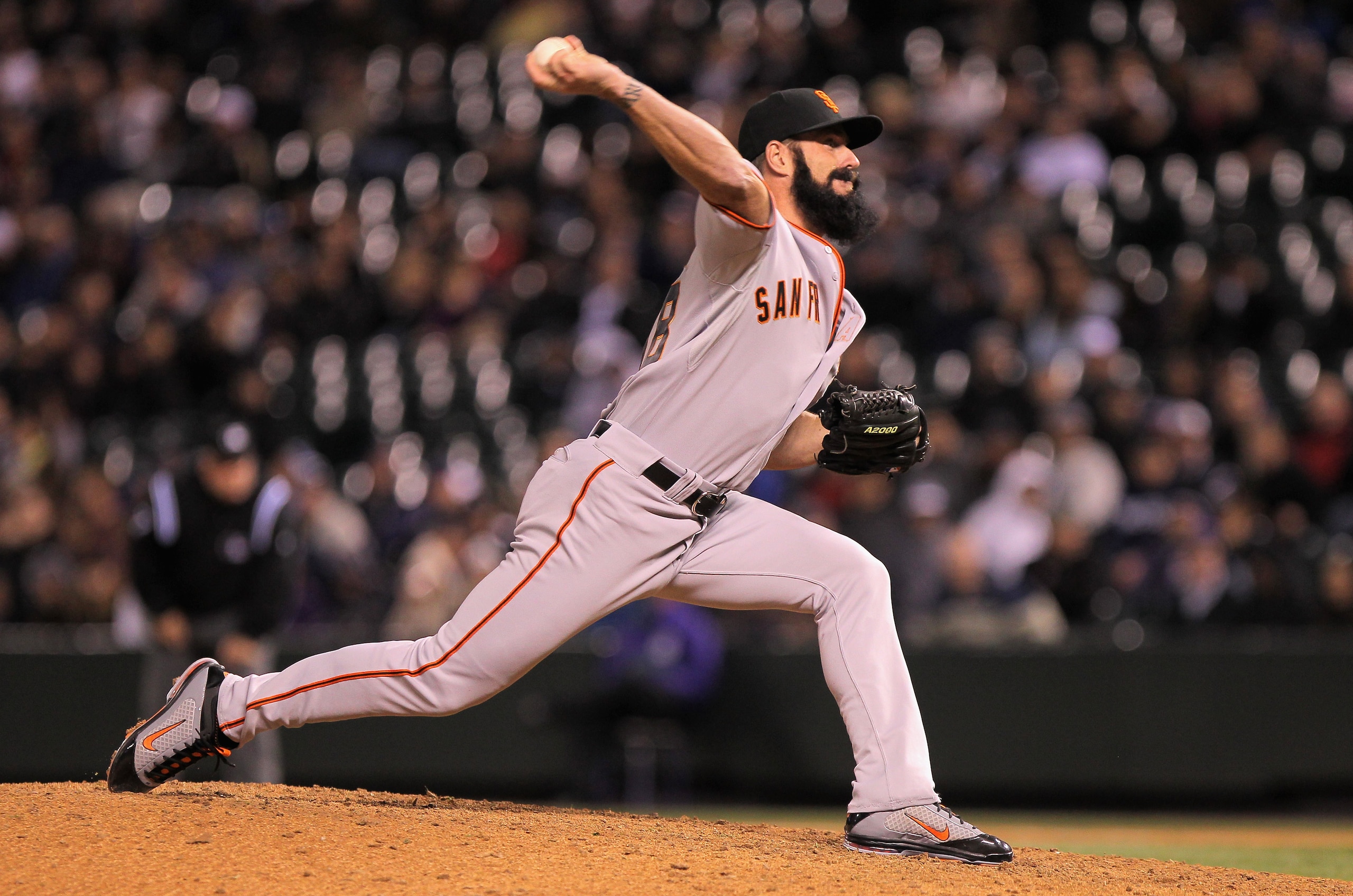 DENVER, CO - APRIL 19: Closer Brian Wilson #38 of the San Francisco Giants pitches in relief in the ninth inning against the Colorado Rockies at Coors Field on April 19, 2011 in Denver, Colorado. Wilson earned a save as the Giants defeated the Rockies 6- DENVER, CO - APRIL 19: Closer Brian Wilson #38 of the San Francisco Giants pitches in relief in the ninth inning against the Colorado Rockies at Coors Field on April 19, 2011 in Denver, Colorado. Wilson earned a save as the Giants defeated the Rockies 6-