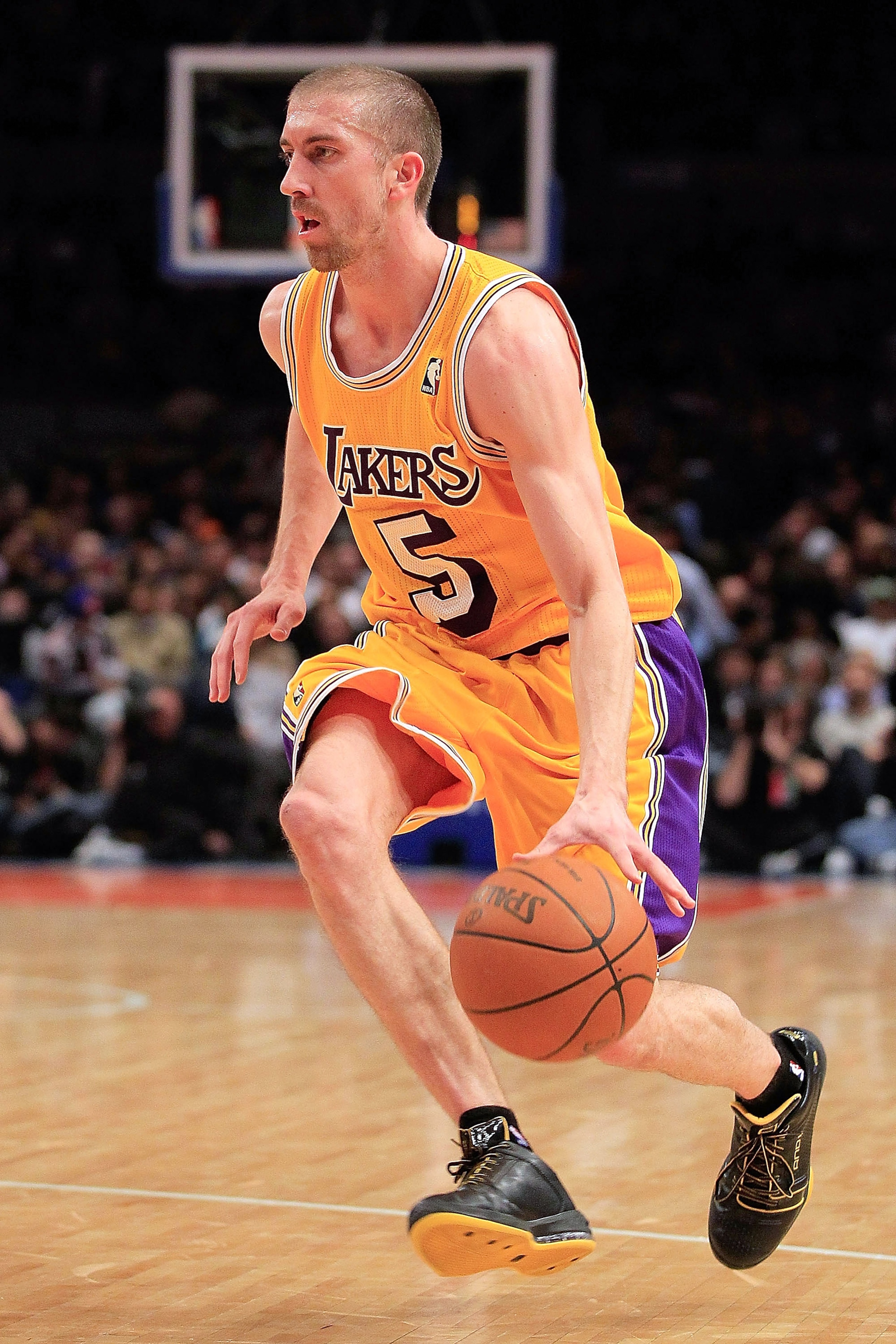 NEW YORK, NY - FEBRUARY 11: Steve Blake #5 of the Los Angeles Lakers dribbles the ball against the New York Knicks at Madison Square Garden on February 11, 2011 in New York City. NOTE TO USER: User expressly acknowledges and agrees that, by downloading an