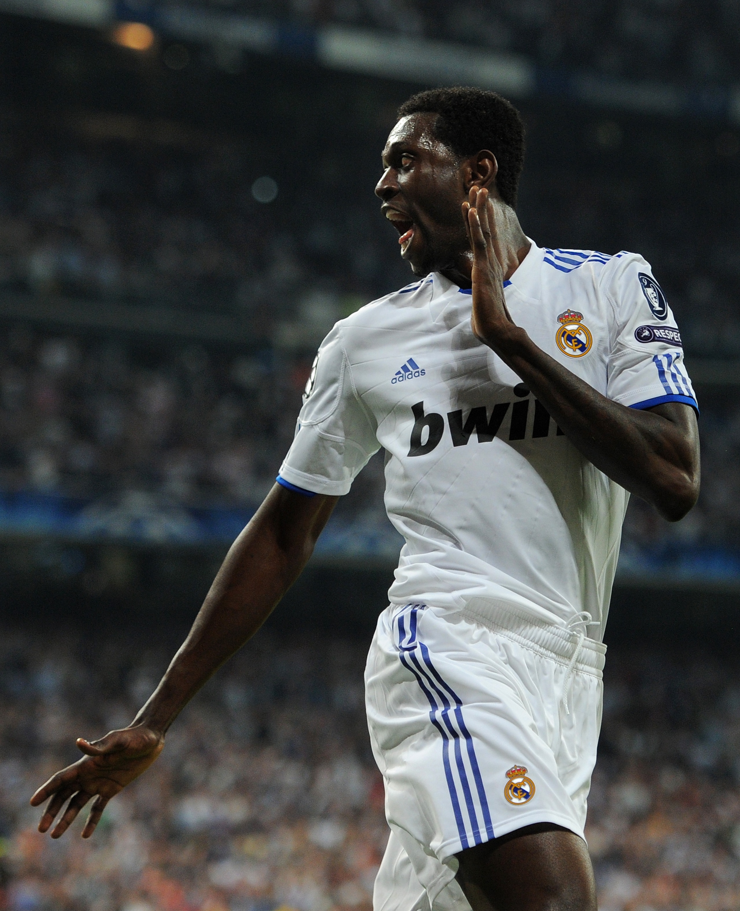 MADRID, SPAIN - APRIL 05:  Emmanuel Adebayor of Real Madrid celebrates scoring his second goal during the UEFA Champions League quarter final first leg match between Real Madrid and Tottenham Hotspur at Estadio Santiago Bernabeu on April 5, 2011 in Madrid