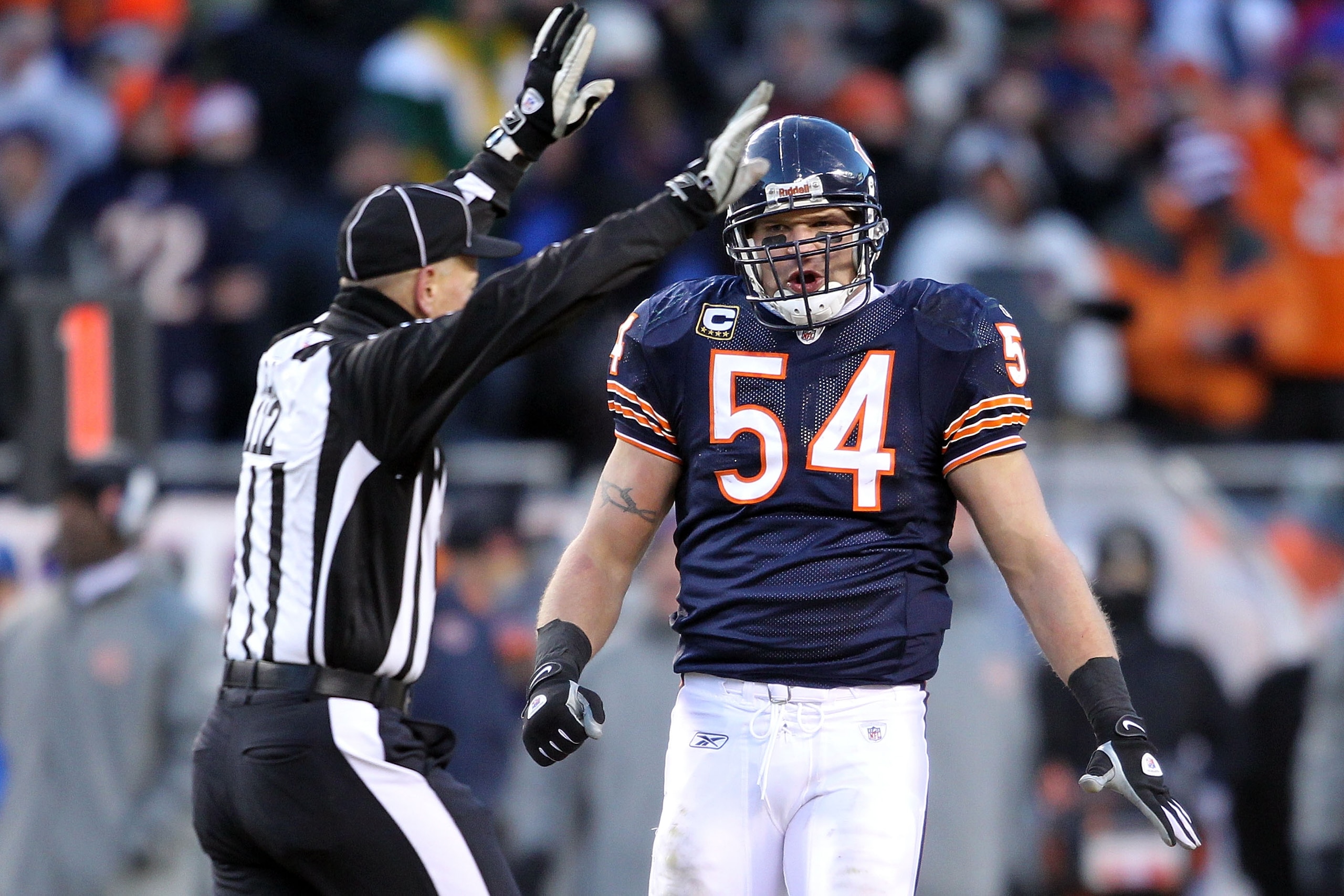 CHICAGO, IL - JANUARY 23:  Brian Urlacher #54 of the Chicago Bears reacts to a penalty called while taking on the Green Bay Packers in the NFC Championship Game at Soldier Field on January 23, 2011 in Chicago, Illinois.  (Photo by Andy Lyons/Getty Images)