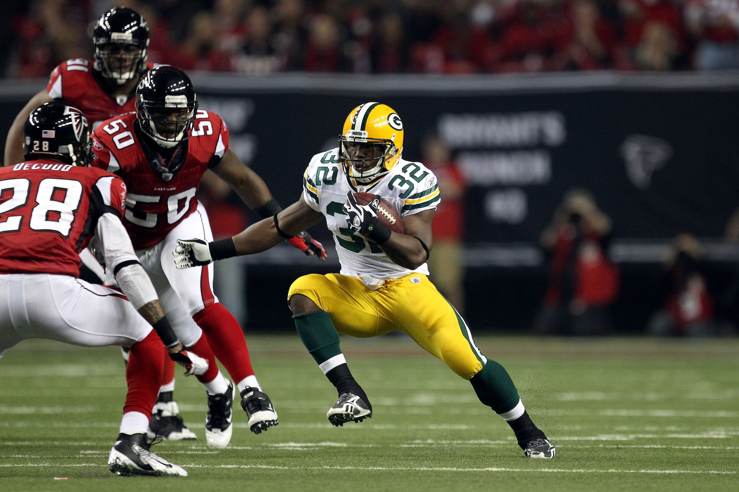 ATLANTA, GA - JANUARY 15:  Brandon Jackson #32 of the Green Bay Packers runs the ball against the Atlanta Falcons during their 2011 NFC divisional playoff game at Georgia Dome on January 15, 2011 in Atlanta, Georgia. The Packers won 48-21. (Photo by Stree