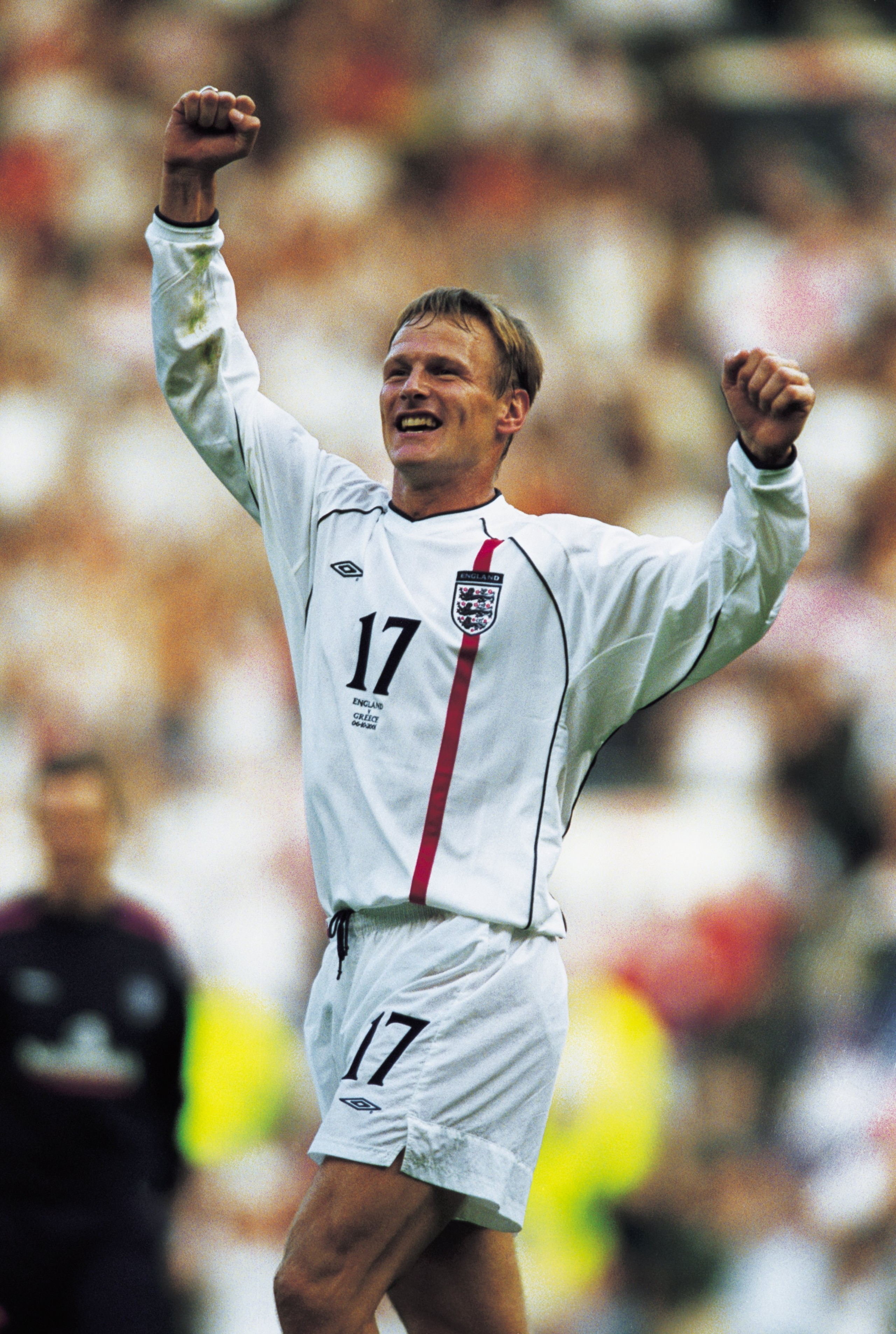 6 Oct 2001:  Teddy Sheringham of England celebrates after the World Cup Group 9 Qualifier between England and Greece at Old Trafford in Manchester, England. Sheringham scored the fastest ever goal by an England substitute as England sealed qualificationaf