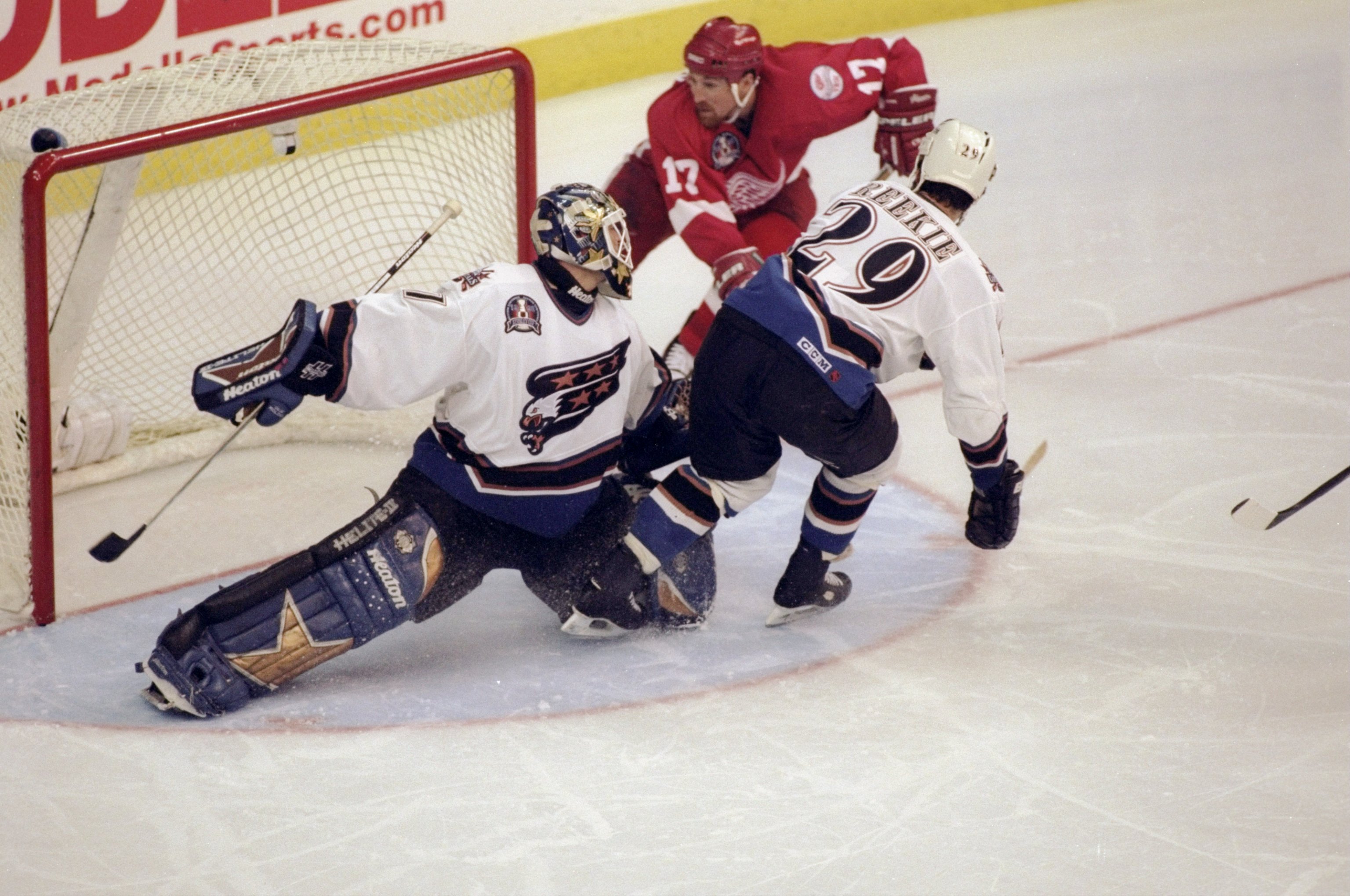 Goalie Ron Hextall of the New York Islanders defends the net