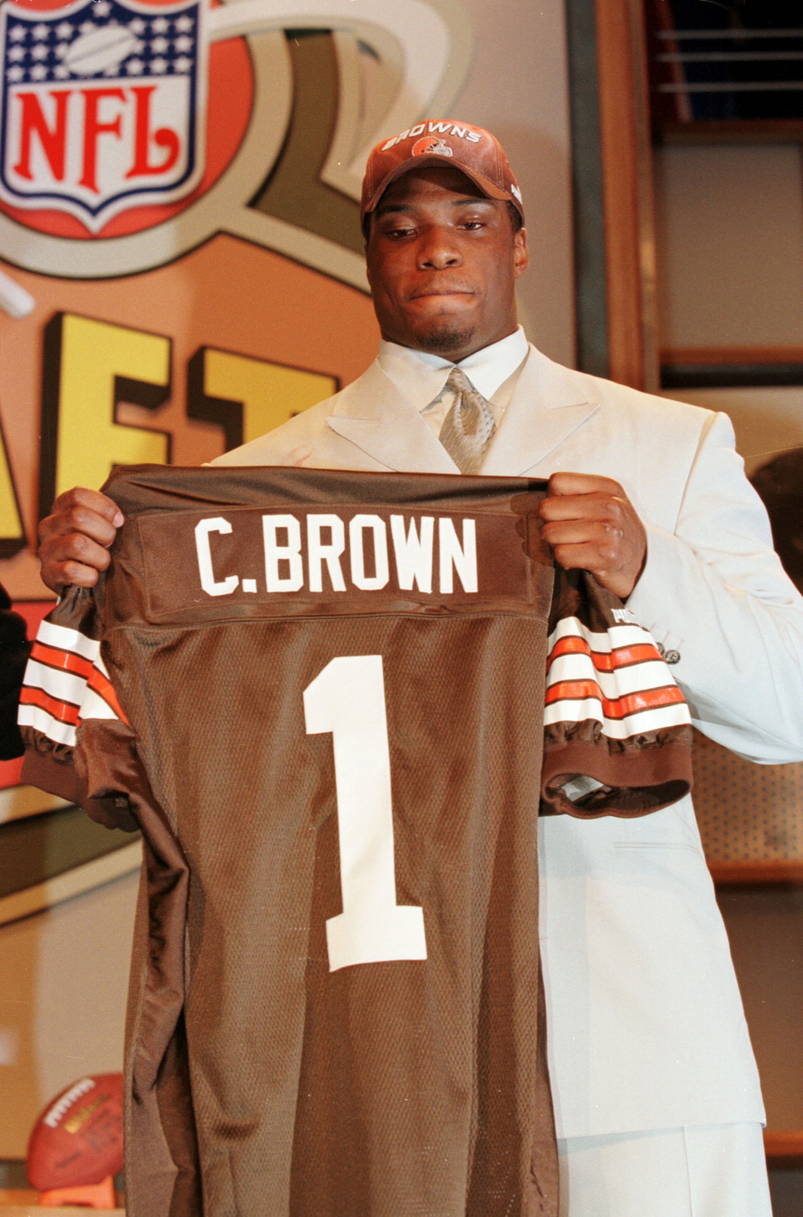 15 Apr 2000:   Courtney Brown holds up a Brown''s jersey after Cleveland made him the number one pick in the 2000 NFL Draft at the Paramount Theater at Madison Square Garden in New York, New York. Mandatory Credit: M. David Leeds/ALLSPORT