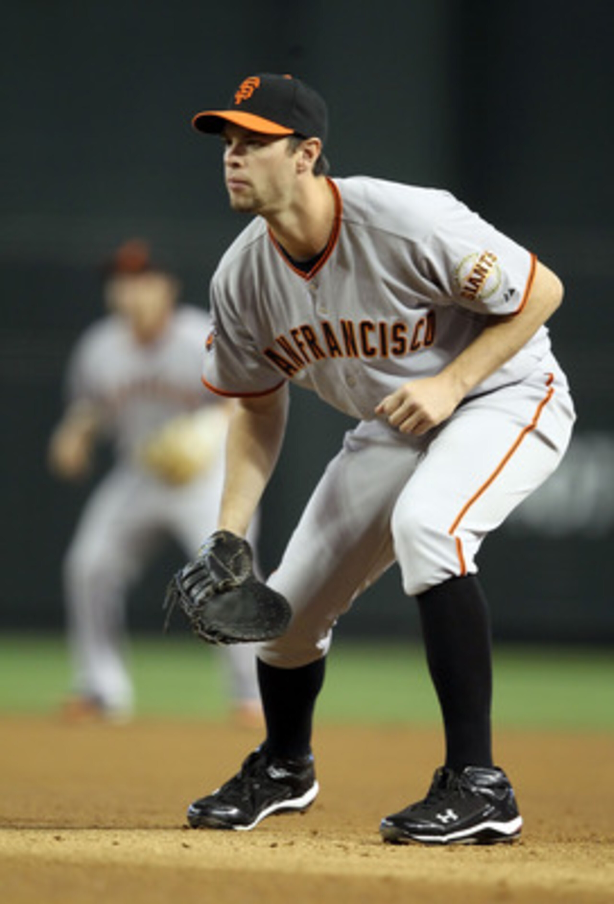 PHOENIX, AZ - APRIL 17:  Infielder Brandon Belt #9 of the San Francisco Giants in action during the Major League Baseball game against the Arizona Diamondbacks at Chase Field on April 17, 2011 in Phoenix, Arizona.  (Photo by Christian Petersen/Getty Image