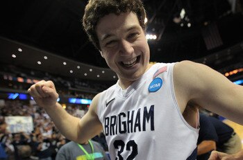 DENVER, CO - MARCH 19:  Jimmer Fredette #32 of the Brigham Young Cougars walks off of the court after defeating the Gonzaga Bulldogs during the third round of the 2011 NCAA men's basketball tournament at Pepsi Center on March 19, 2011 in Denver, Colorado.