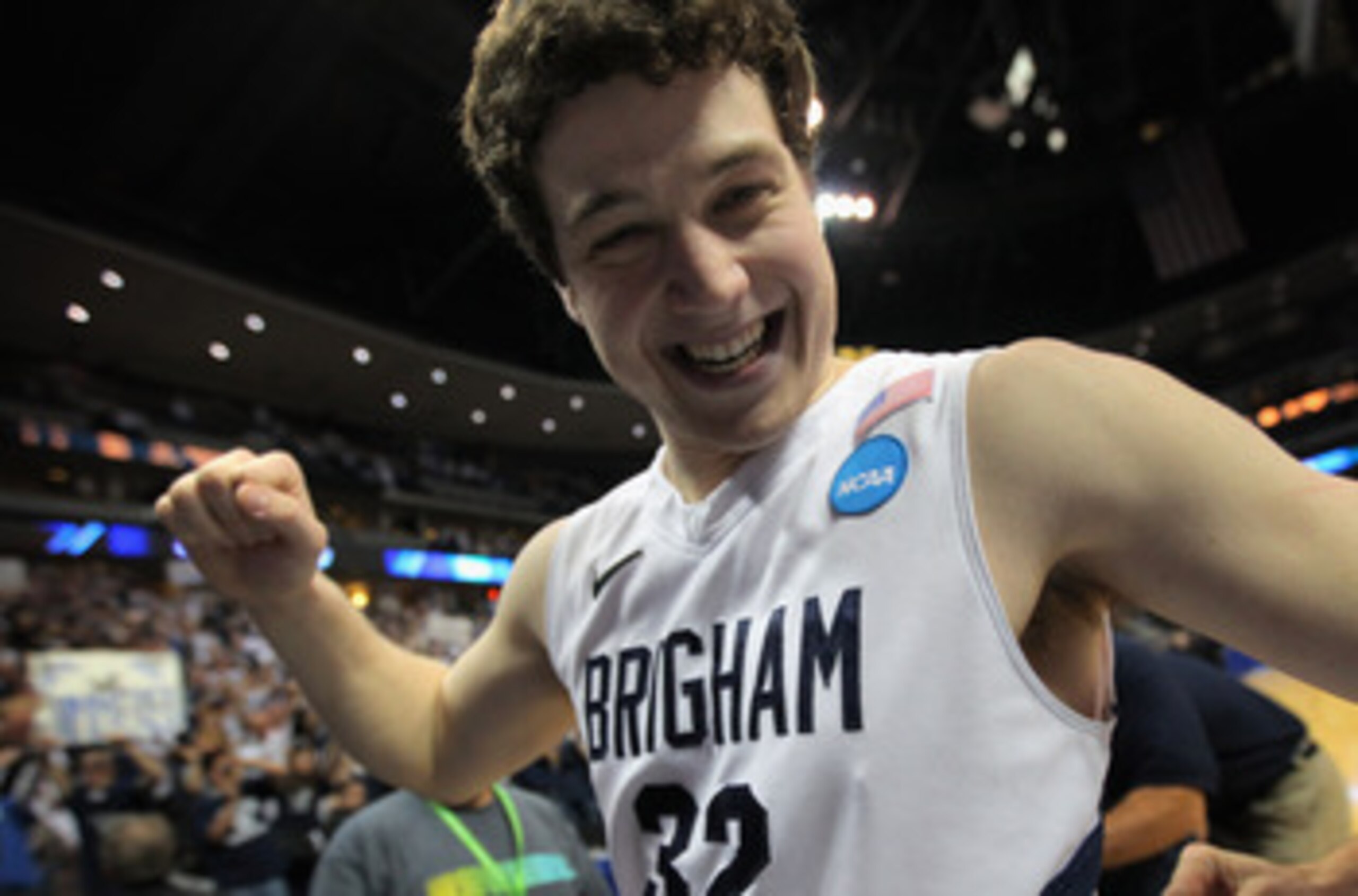 DENVER, CO - MARCH 19: Jimmer Fredette #32 of the Brigham Young Cougars walks off of the court after defeating the Gonzaga Bulldogs during the third round of the 2011 NCAA men's basketball tournament at Pepsi Center on March 19, 2011 in Denver, Colorado. DENVER, CO - MARCH 19: Jimmer Fredette #32 of the Brigham Young Cougars walks off of the court after defeating the Gonzaga Bulldogs during the third round of the 2011 NCAA men's basketball tournament at Pepsi Center on March 19, 2011 in Denver, Colorado.