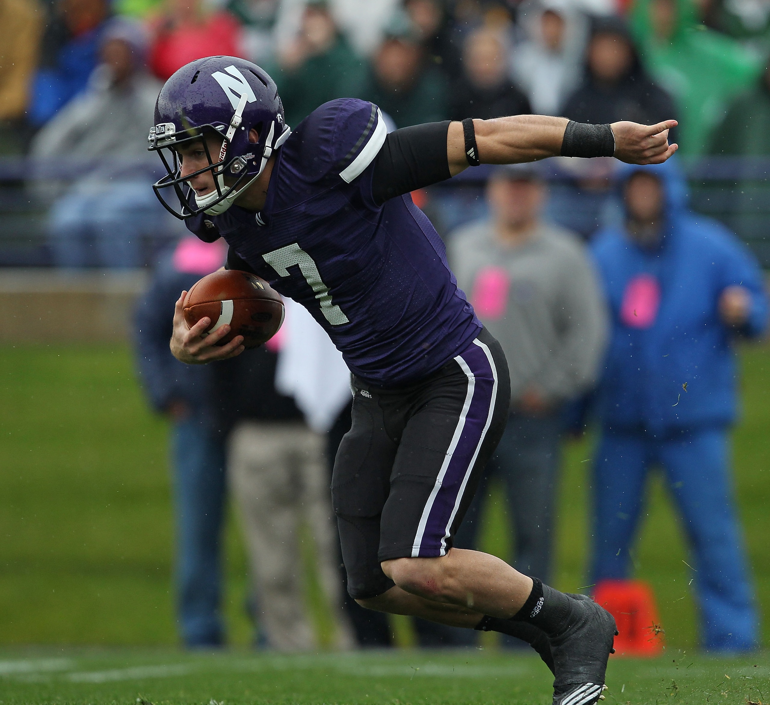 EVANSTON, IL - OCTOBER 23: Dan Persa #7 of the Northwestern Wildcats runs against the Michigan State Spartans at Ryan Field on October 23, 2010 in Evanston, Illinois. Michigan State defeated Northwestern 35-27. (Photo by Jonathan Daniel/Getty Images) EVANSTON, IL - OCTOBER 23: Dan Persa #7 of the Northwestern Wildcats runs against the Michigan State Spartans at Ryan Field on October 23, 2010 in Evanston, Illinois. Michigan State defeated Northwestern 35-27. (Photo by Jonathan Daniel/Getty Images)