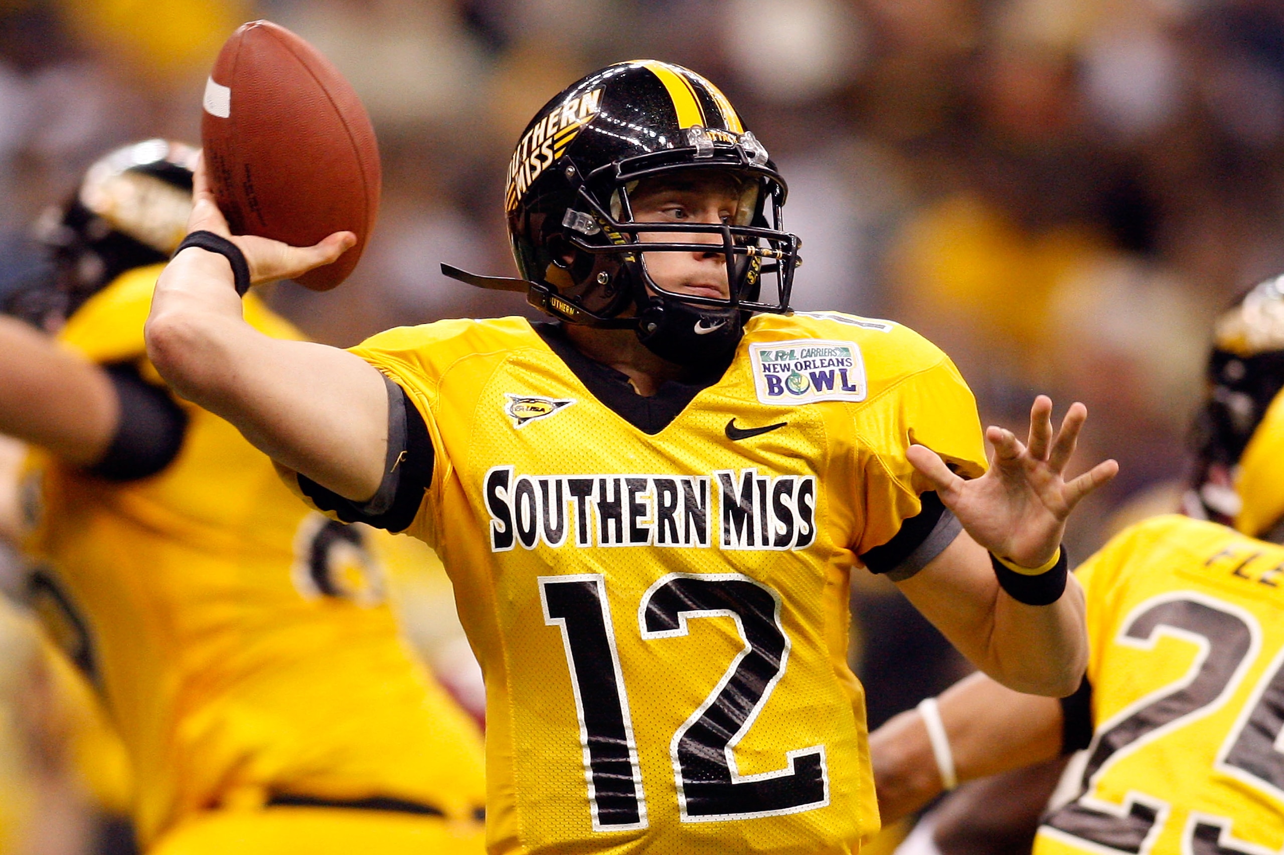 NEW ORLEANS - DECEMBER 21: Quarterback Austin Davis #12 of the Southern Mississippi Golden Eagles looks to throw a pass against the Troy Trojans during the R+L Carriers New Orleans Bowl on December 21, 2008 at the Superdome in New Orleans, Louisiana. Davi NEW ORLEANS - DECEMBER 21: Quarterback Austin Davis #12 of the Southern Mississippi Golden Eagles looks to throw a pass against the Troy Trojans during the R+L Carriers New Orleans Bowl on December 21, 2008 at the Superdome in New Orleans, Louisiana. Davi