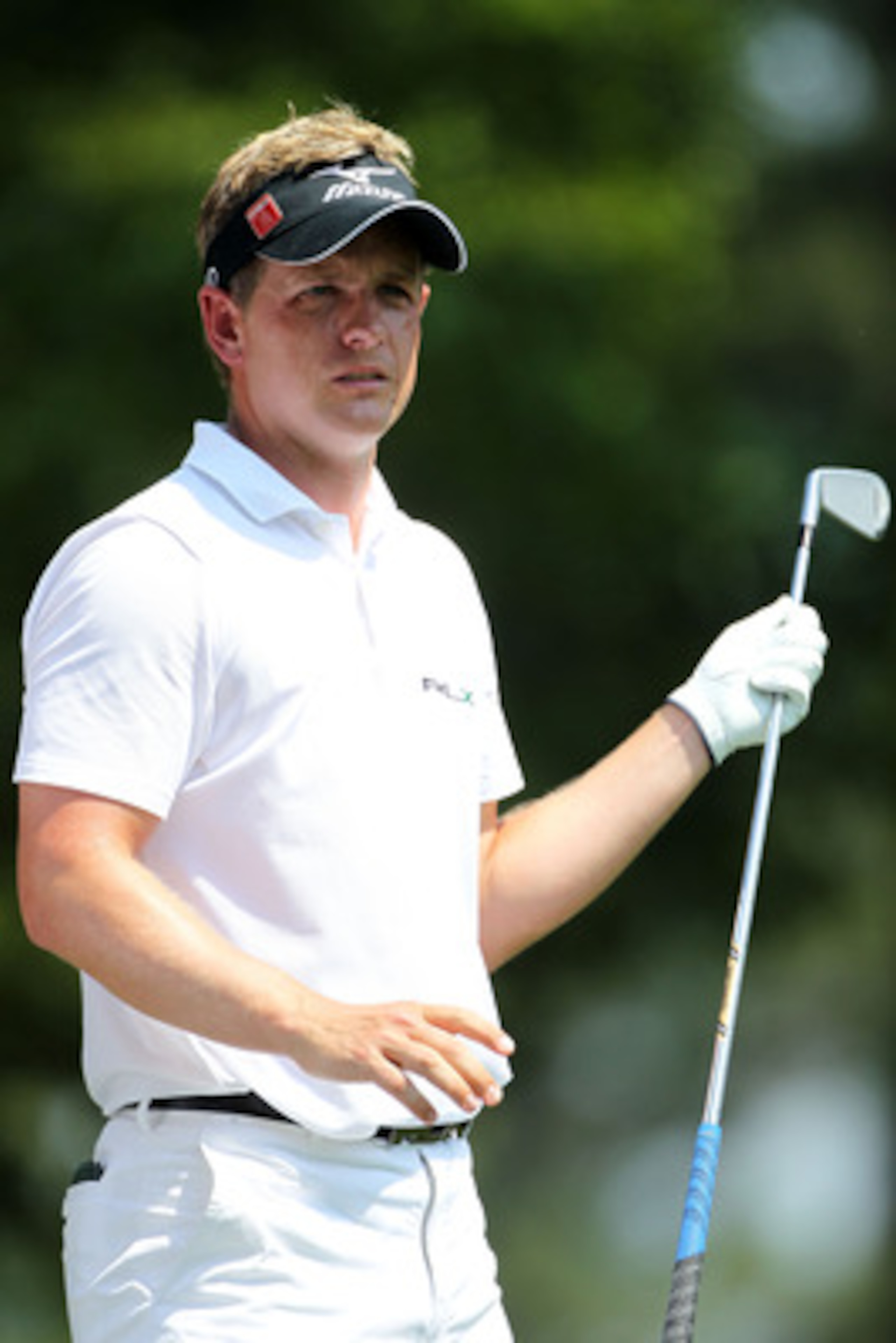 AUGUSTA, GA - APRIL 10:  Luke Donald of England hands off a club during the final round of the 2011 Masters Tournament at Augusta National Golf Club on April 10, 2011 in Augusta, Georgia.  (Photo by Jamie Squire/Getty Images)