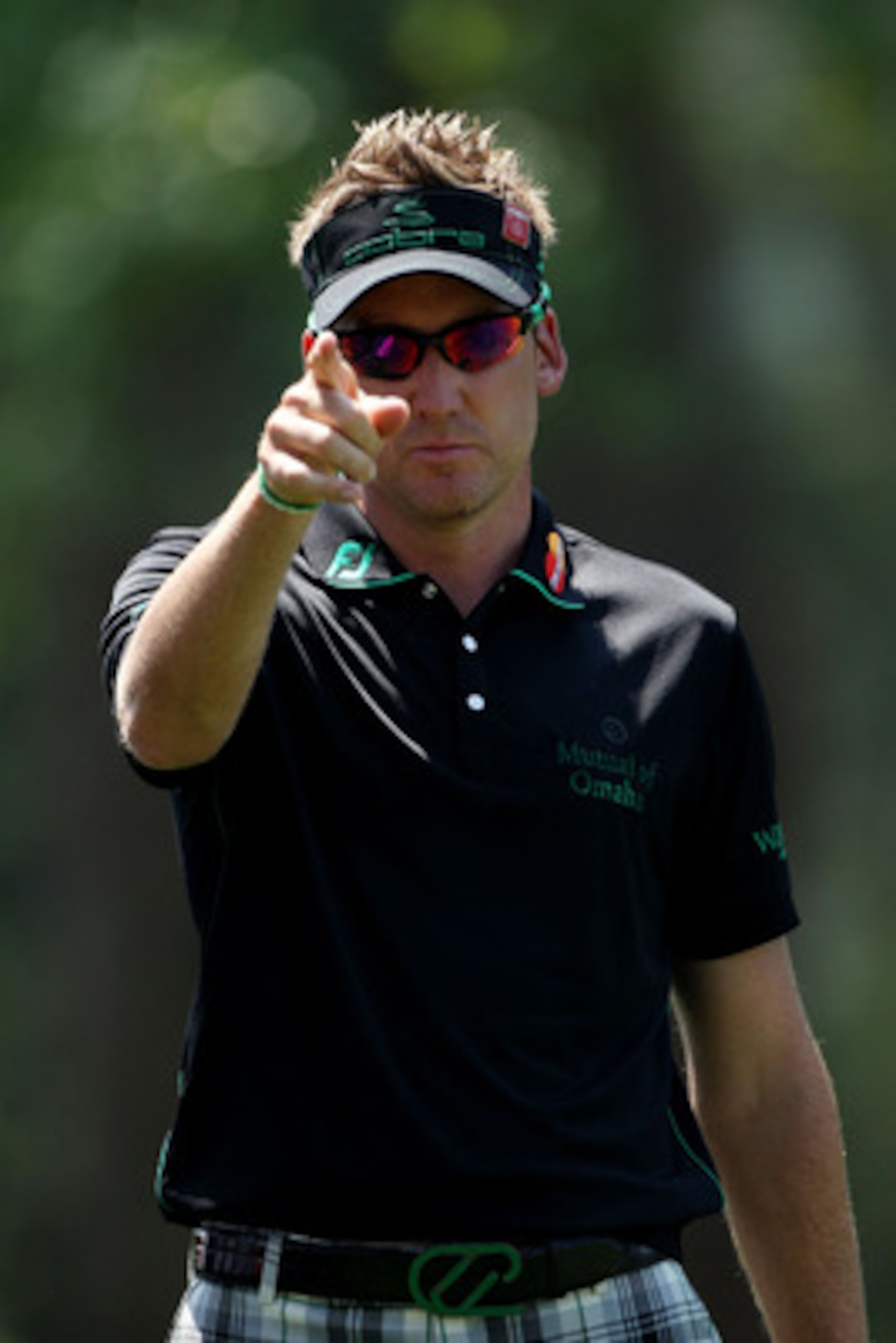 AUGUSTA, GA - APRIL 10:  Ian Poulter of England  walks across the first green during the final round of the 2011 Masters Tournament at Augusta National Golf Club on April 10, 2011 in Augusta, Georgia.  (Photo by Andrew Redington/Getty Images)