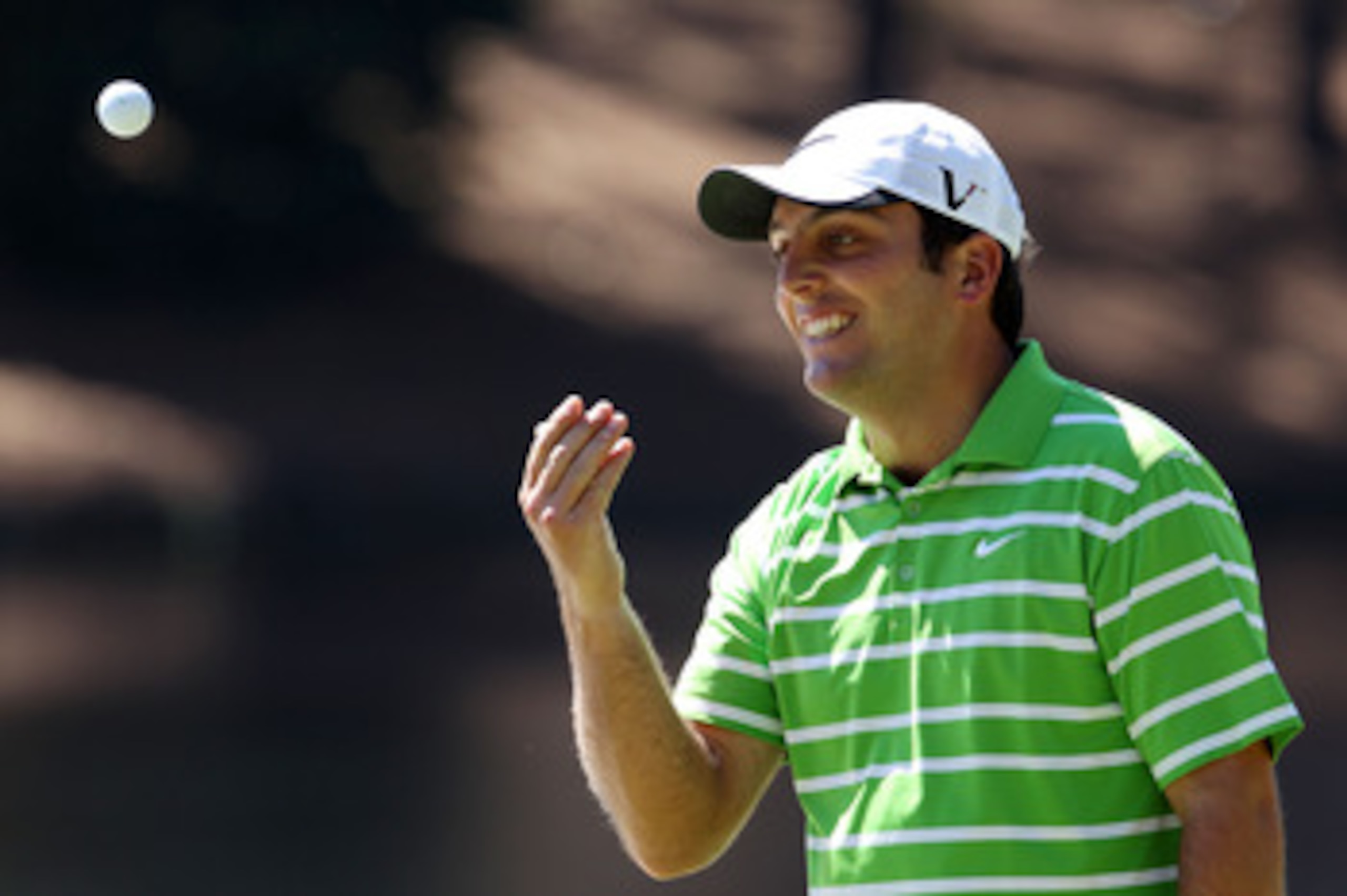 AUGUSTA, GA - APRIL 06:  Francesco Molinari of Italy tosses his golf ball in the air during the Par 3 Contest prior to the 2011 Masters Tournament at Augusta National Golf Club on April 6, 2011 in Augusta, Georgia.  (Photo by Andrew Redington/Getty Images