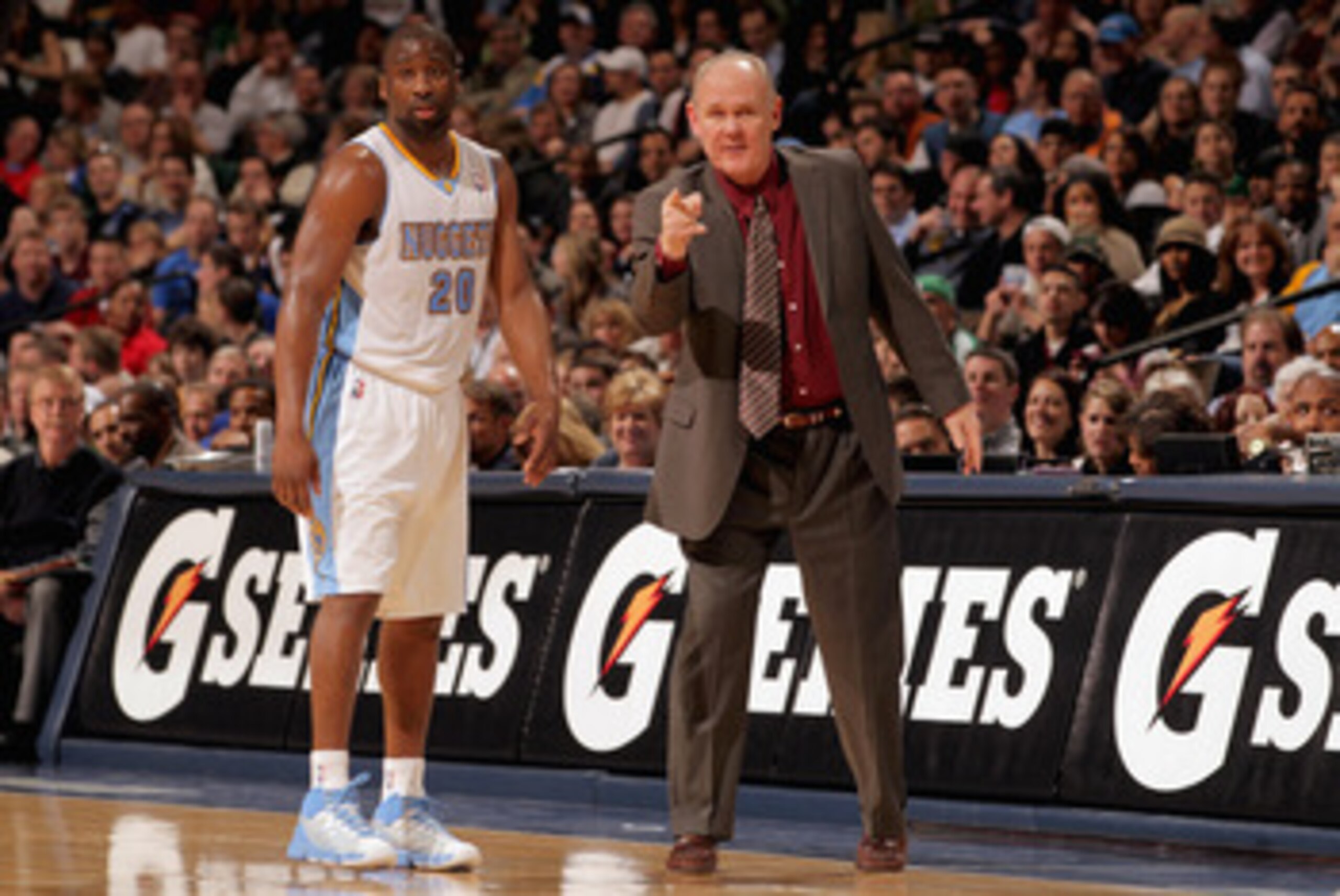 DENVER, CO - FEBRUARY 24: Head coach George Karl directs Raymond Felton #20 of the Denver Nuggets against the Boston Celtics during NBA action at the Pepsi Center on February 24, 2011 in Denver, Colorado. The Nuggets defeated the Celtics 89-75. NOTE TO U DENVER, CO - FEBRUARY 24: Head coach George Karl directs Raymond Felton #20 of the Denver Nuggets against the Boston Celtics during NBA action at the Pepsi Center on February 24, 2011 in Denver, Colorado. The Nuggets defeated the Celtics 89-75. NOTE TO U