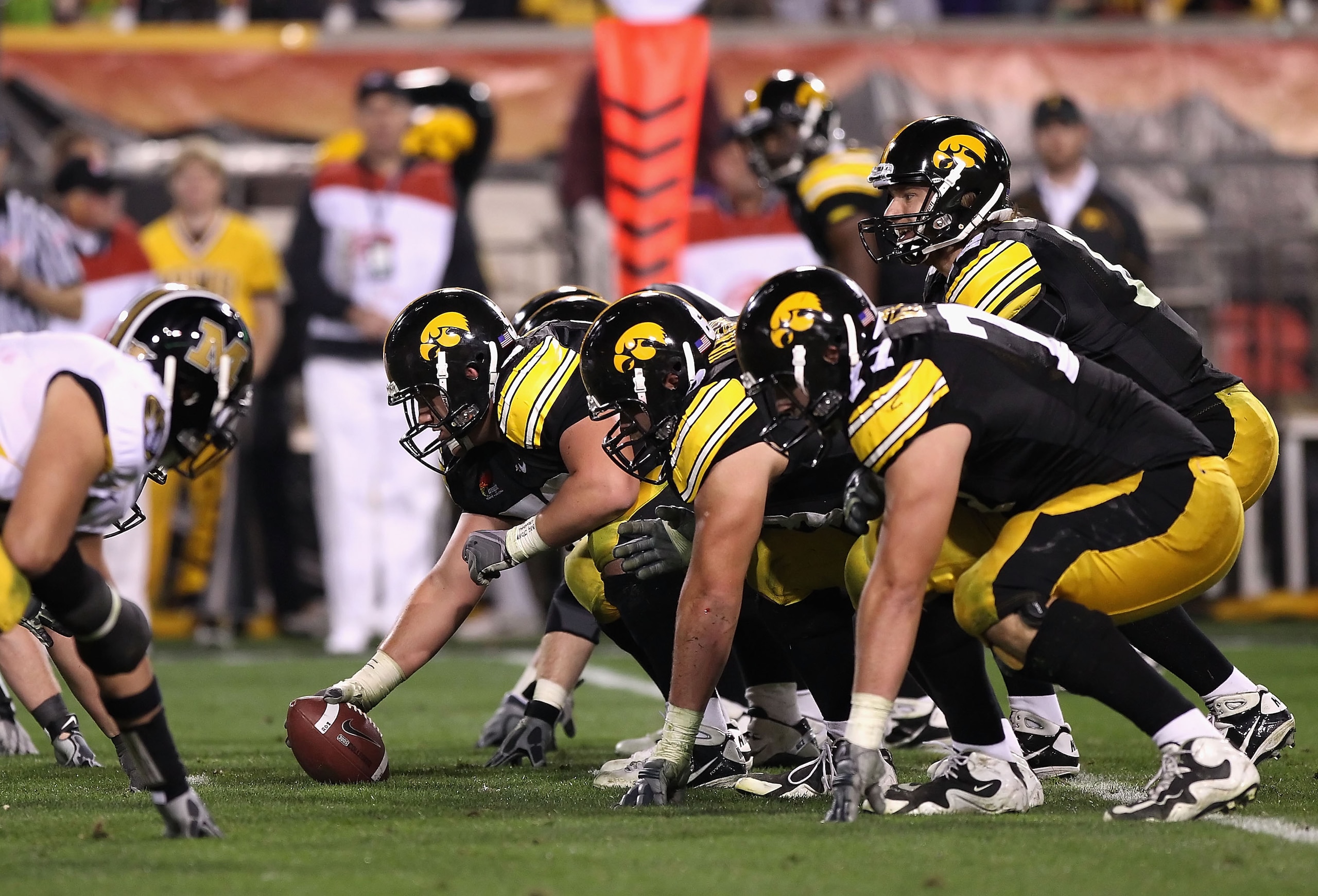 TEMPE, AZ - DECEMBER 28: Quarterback Ricky Stanzi #12 of the Iowa Hawkeyes prepares to snap the ball during the Insight Bowl against the Missouri Tigers at Sun Devil Stadium on December 28, 2010 in Tempe, Arizona. The Hawkeyes defeated the Tigers 27-24. TEMPE, AZ - DECEMBER 28: Quarterback Ricky Stanzi #12 of the Iowa Hawkeyes prepares to snap the ball during the Insight Bowl against the Missouri Tigers at Sun Devil Stadium on December 28, 2010 in Tempe, Arizona. The Hawkeyes defeated the Tigers 27-24.