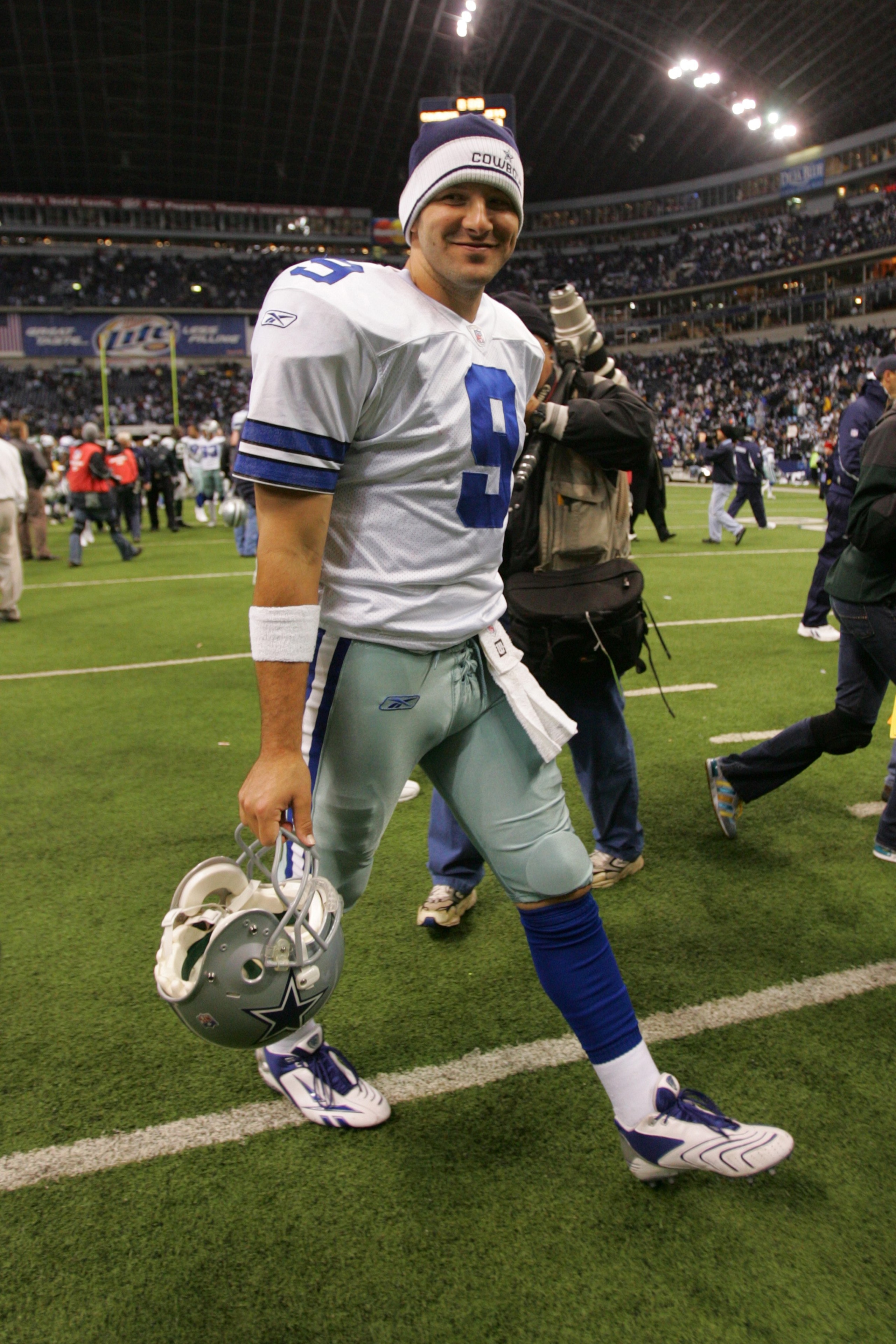 IRVING - NOVEMBER 22:  Tony Romo #9 of the Dallas Cowboys smiles during the NFL game against the New York Jets at Texas Stadium on November 22, 2007 in Irving, Texas. (Photo by Ronald Martinez/Getty Images)
