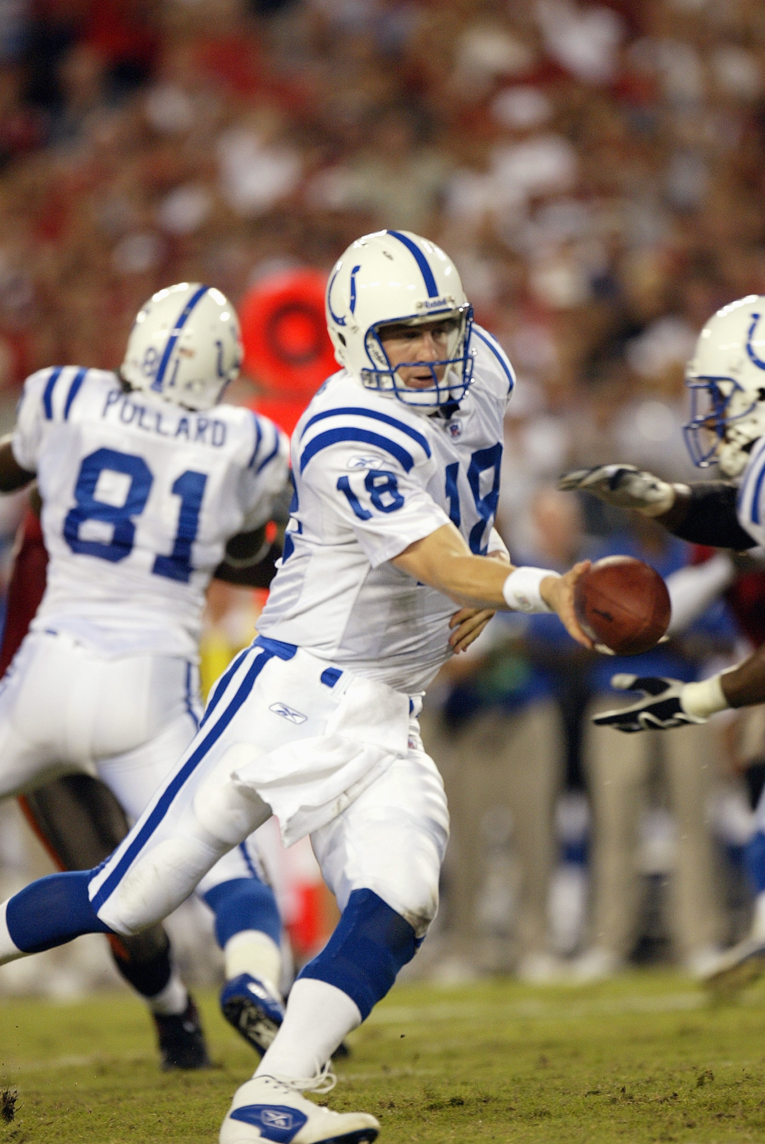 TAMPA, FL - OCTOBER 6:  Quarterback Peyton Manning #18 of the Indianapolis Colts hands off against the Tampa Bay Buccaneers on October 6, 2003 at Raymond James Stadium in Tampa, Florida. The Colts defeated the Buccaneers 38-35 in overtime. (Photo by Eliot