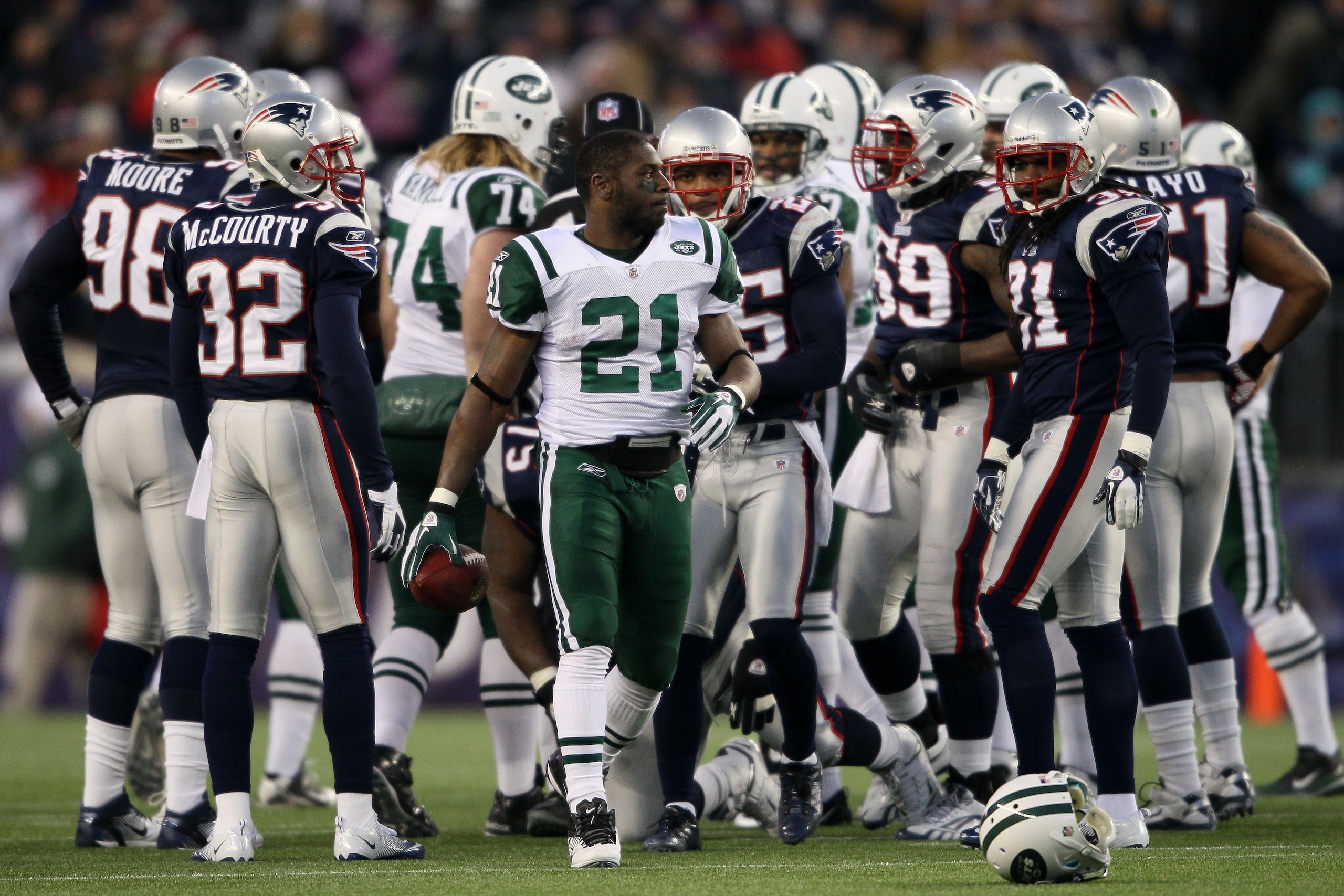 FOXBORO, MA - JANUARY 16:  Running back LaDainian Tomlinson #21 of the New York Jets walks with the ball after a play against the New England Patriots during their 2011 AFC divisional playoff game at Gillette Stadium on January 16, 2011 in Foxboro, Massac