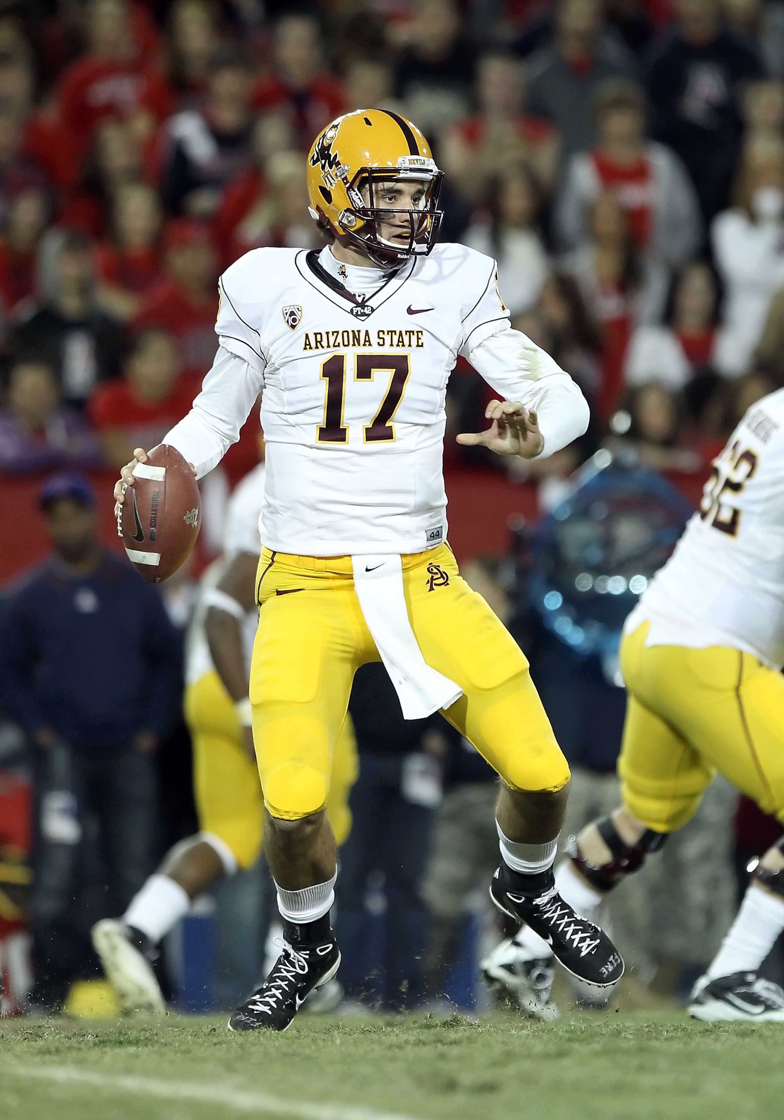 TUCSON, AZ - DECEMBER 02: Quarterback Brock Osweiler #17 of the Arizona State Sun Devils scrambles with the football during the college football game at Arizona Stadium on December 2, 2010 in Tucson, Arizona. The Sun Devils defeated the Wildcats 30-29 in TUCSON, AZ - DECEMBER 02: Quarterback Brock Osweiler #17 of the Arizona State Sun Devils scrambles with the football during the college football game at Arizona Stadium on December 2, 2010 in Tucson, Arizona. The Sun Devils defeated the Wildcats 30-29 in
