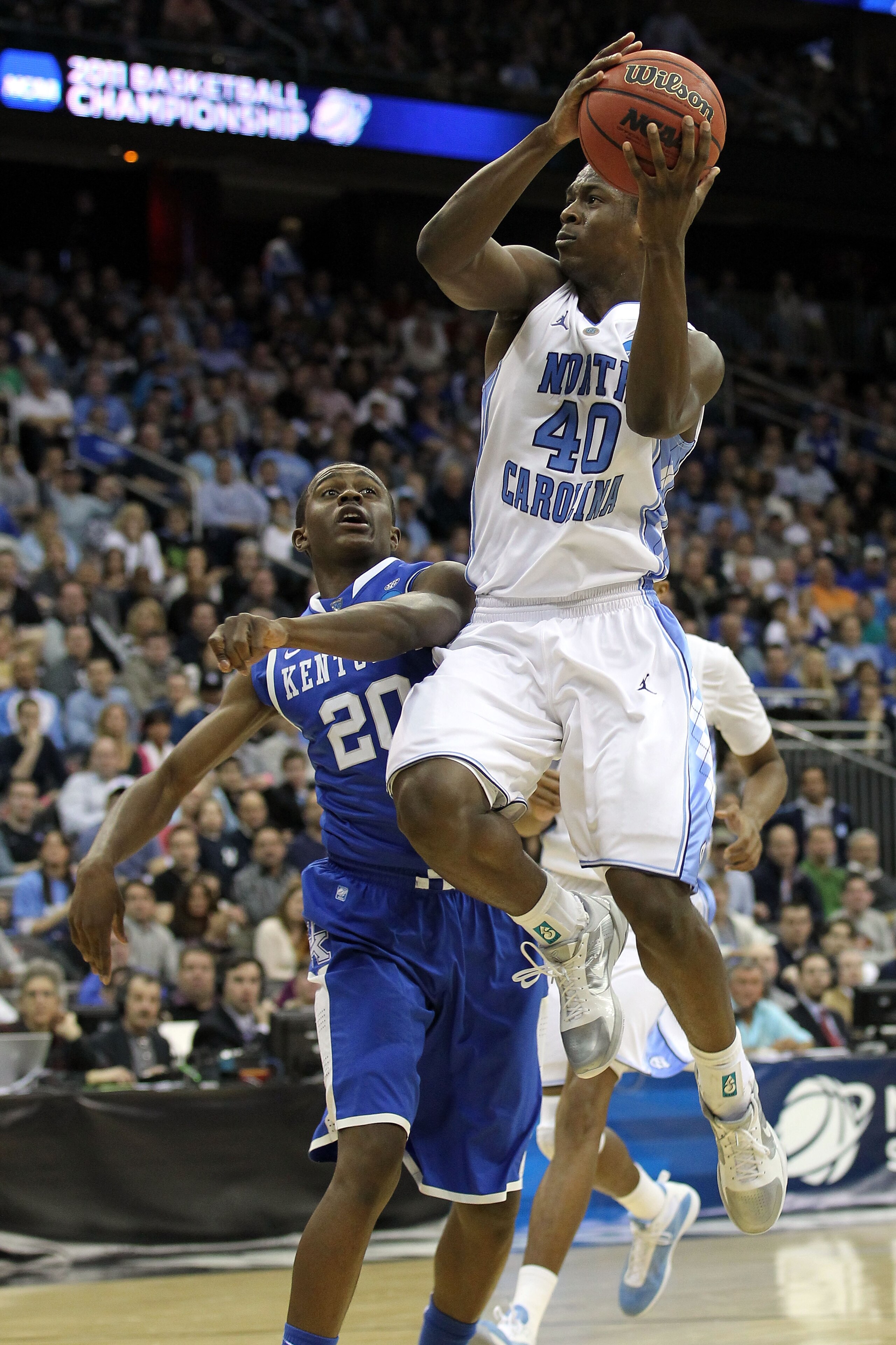 NEWARK, NJ - MARCH 27:  Harrison Barnes #40 of the North Carolina Tar Heels goes for a layup against Doron Lamb #20 of the Kentucky Wildcats during the east regional final of the 2011 NCAA men's basketball tournament at Prudential Center on March 27, 2011