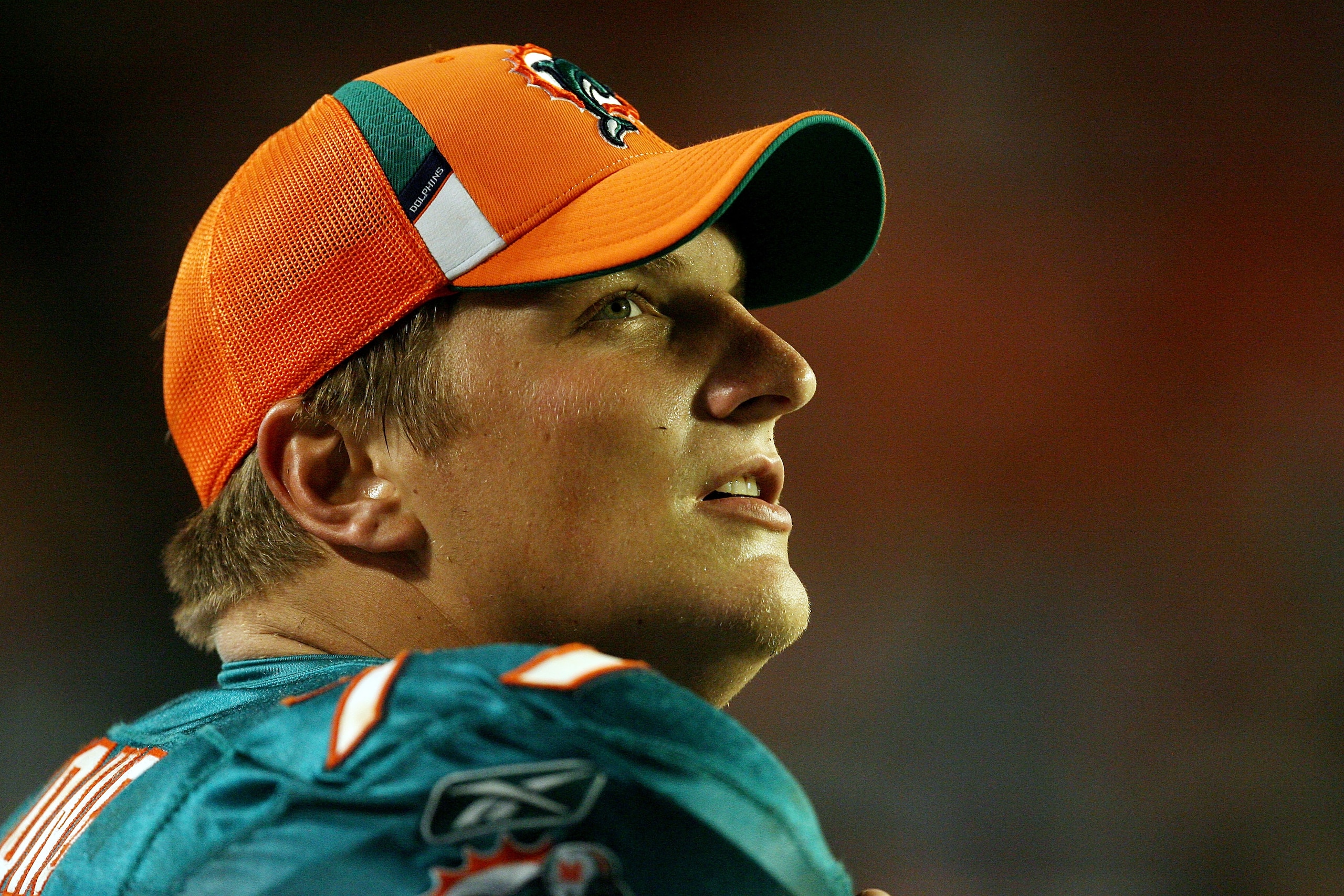 MIAMI - AUGUST 22: Offensive tackle Jake Long #77 of the Miami Dolphins watches from the sidelines as his team takes on the Carolina Panthers during a pre-season game at Land Shark Stadium on August 22, 2009 in Miami, Florida. The Dolphins defeated the P MIAMI - AUGUST 22: Offensive tackle Jake Long #77 of the Miami Dolphins watches from the sidelines as his team takes on the Carolina Panthers during a pre-season game at Land Shark Stadium on August 22, 2009 in Miami, Florida. The Dolphins defeated the P