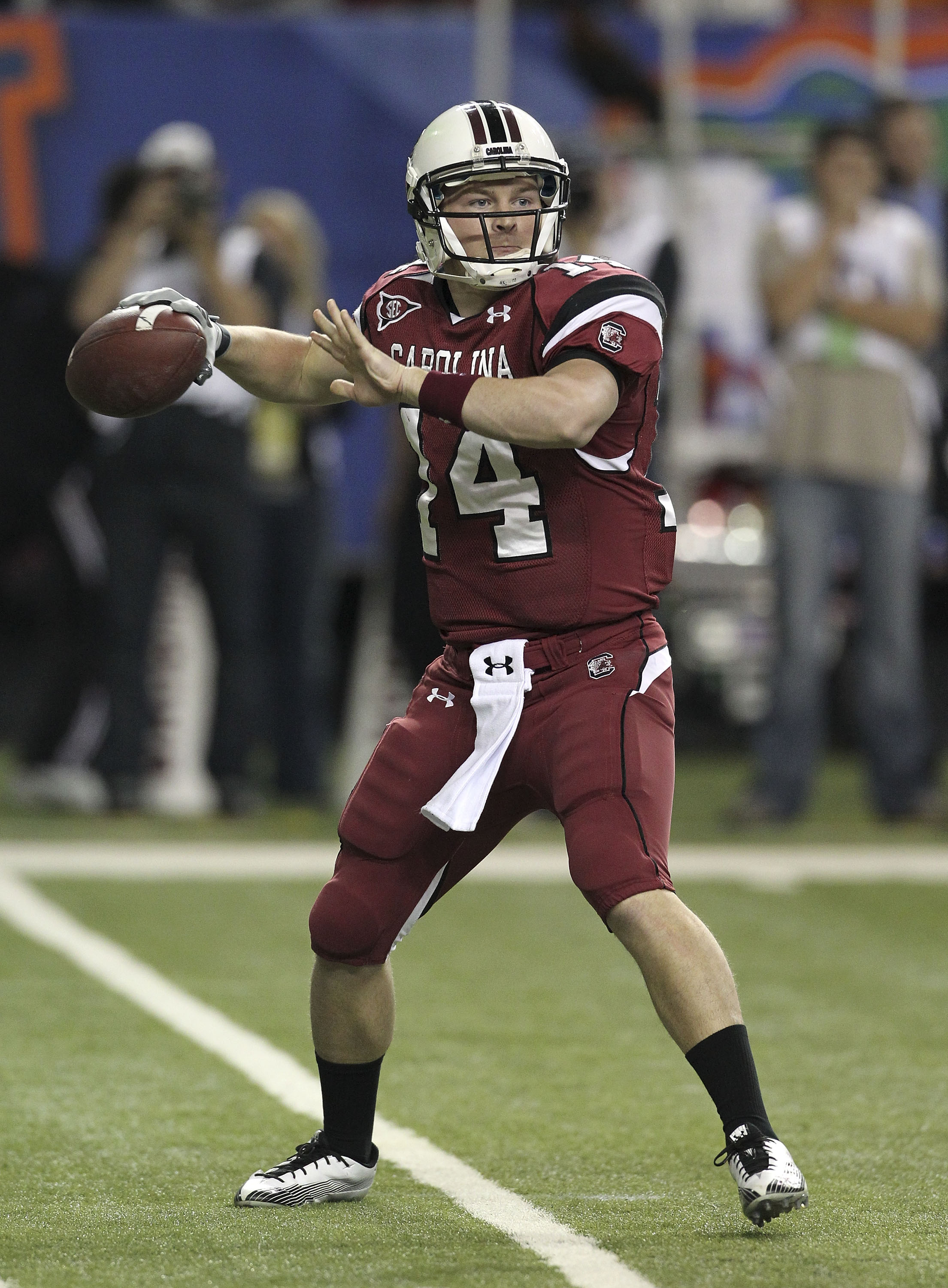ATLANTA - DECEMBER 04:  Quarterback Connor Shaw #14 of the South Carolina Gamecocks throws a pass during the 2010 SEC Championship against the Auburn Tigers at Georgia Dome on December 4, 2010 in Atlanta, Georgia.  (Photo by Mike Zarrilli/Getty Images)