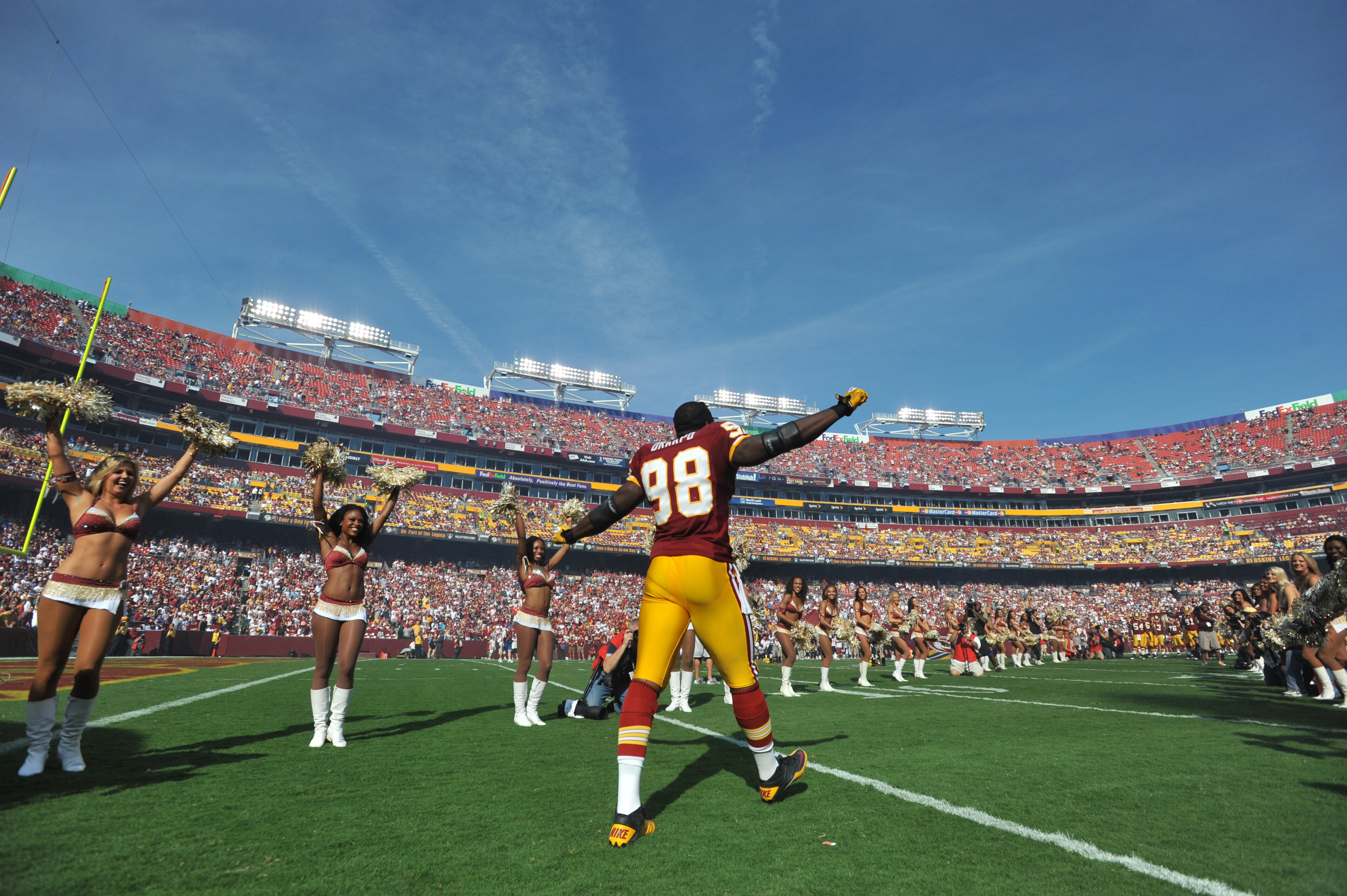 LANDOVER - SEPTEMBER 19:  Brian Orakpo #98 of the Washington Redskins is introduced before the game against the Houston Texans at FedExField on September 19, 2010 in Landover, Maryland. The Texans defeated the Redskins in overtime 30-27. (Photo by Larry F