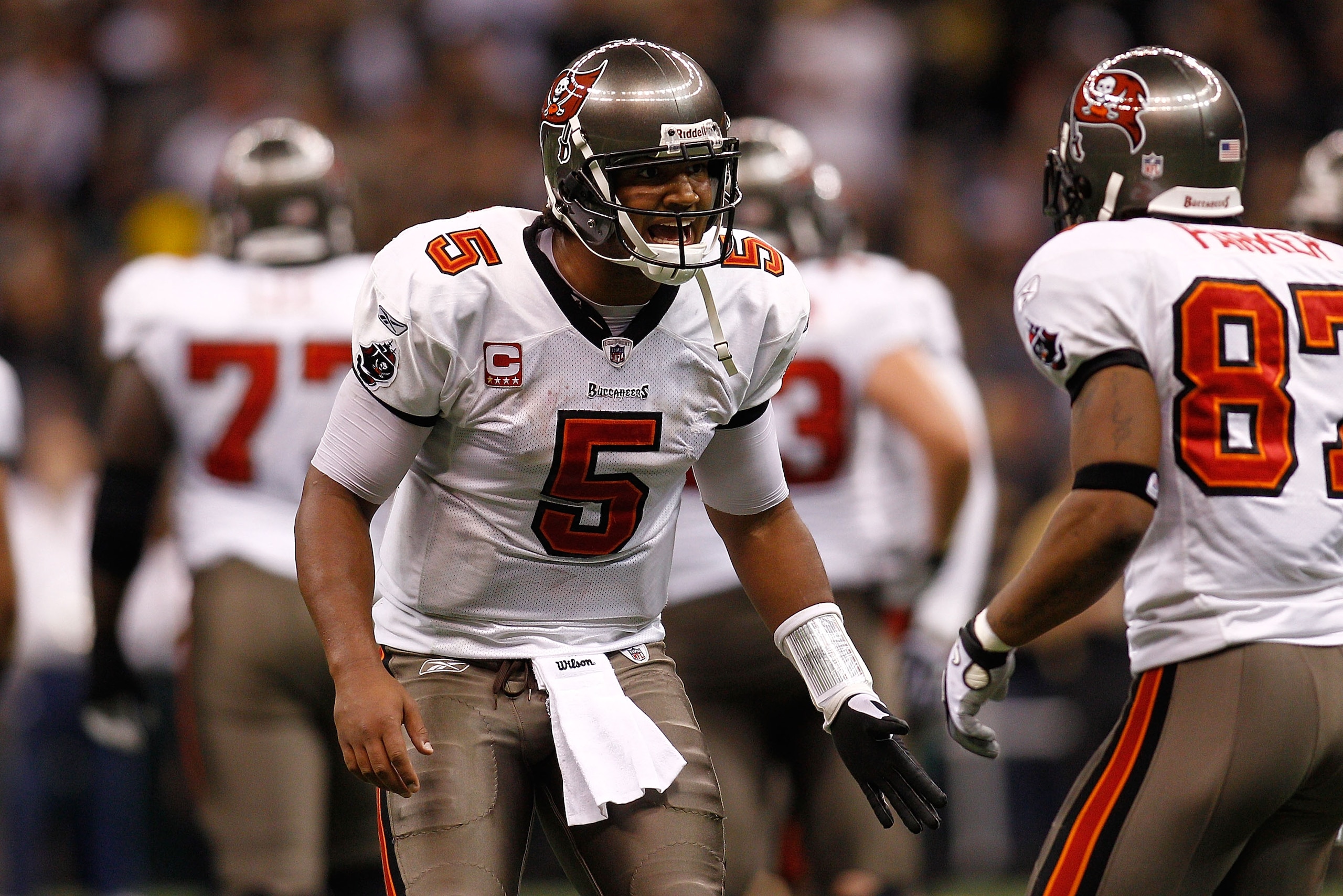 NEW ORLEANS, LA - JANUARY 02: Quarterback Josh Freeman #5 talks with Preston Parker #87 of the Tampa Bay Buccaneers during the game against the New Orleans Saints at the Louisiana Superdome on January 2, 2011 in New Orleans, Louisiana. The Buccaneers d NEW ORLEANS, LA - JANUARY 02: Quarterback Josh Freeman #5 talks with Preston Parker #87 of the Tampa Bay Buccaneers during the game against the New Orleans Saints at the Louisiana Superdome on January 2, 2011 in New Orleans, Louisiana. The Buccaneers d