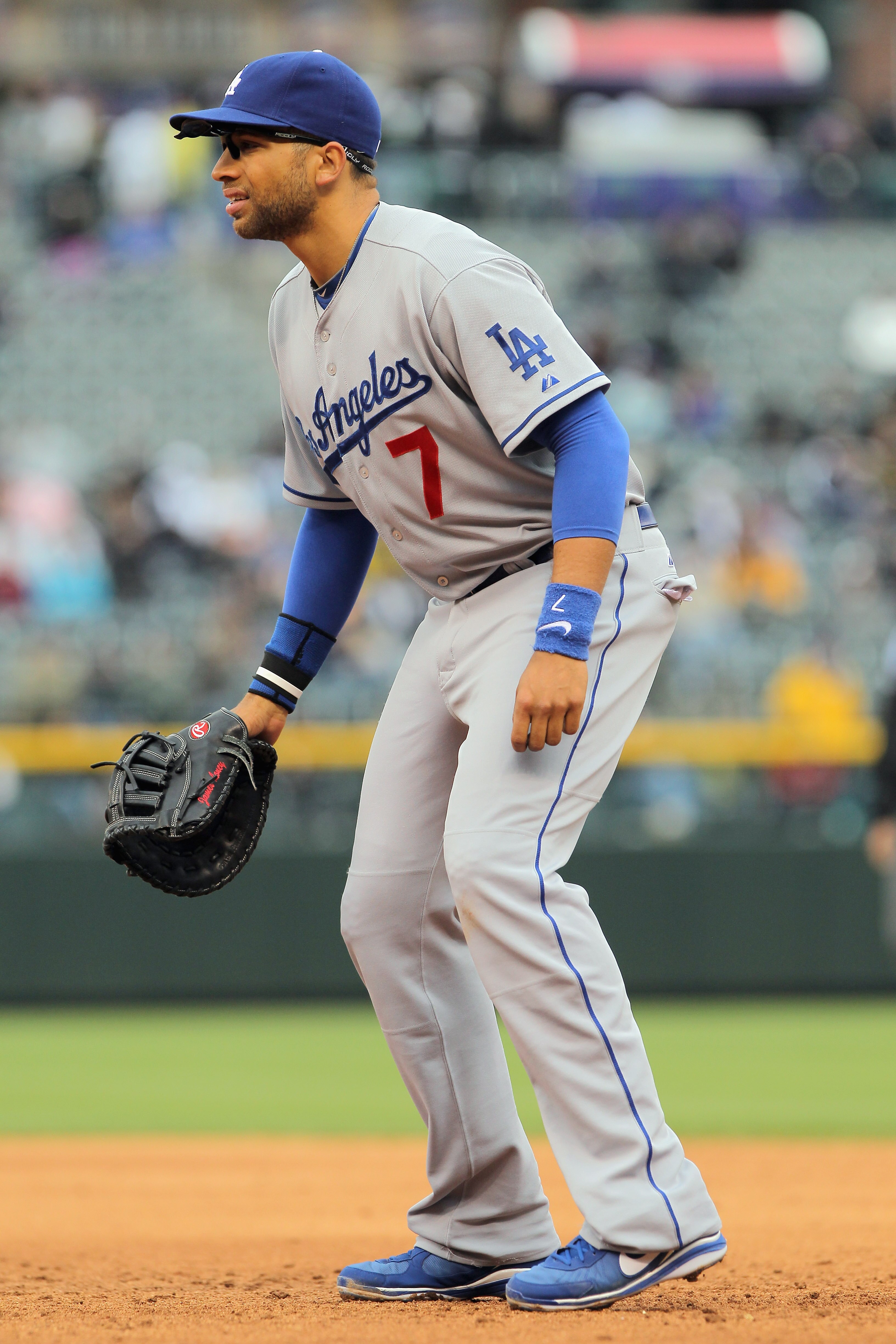 DENVER, CO - APRIL 06:  First baseman James Loney #7 of the Los Angeles Dodgers plays defense against the Colorado Rockies at Coors Field on April 6, 2011 in Denver, Colorado.  (Photo by Doug Pensinger/Getty Images)