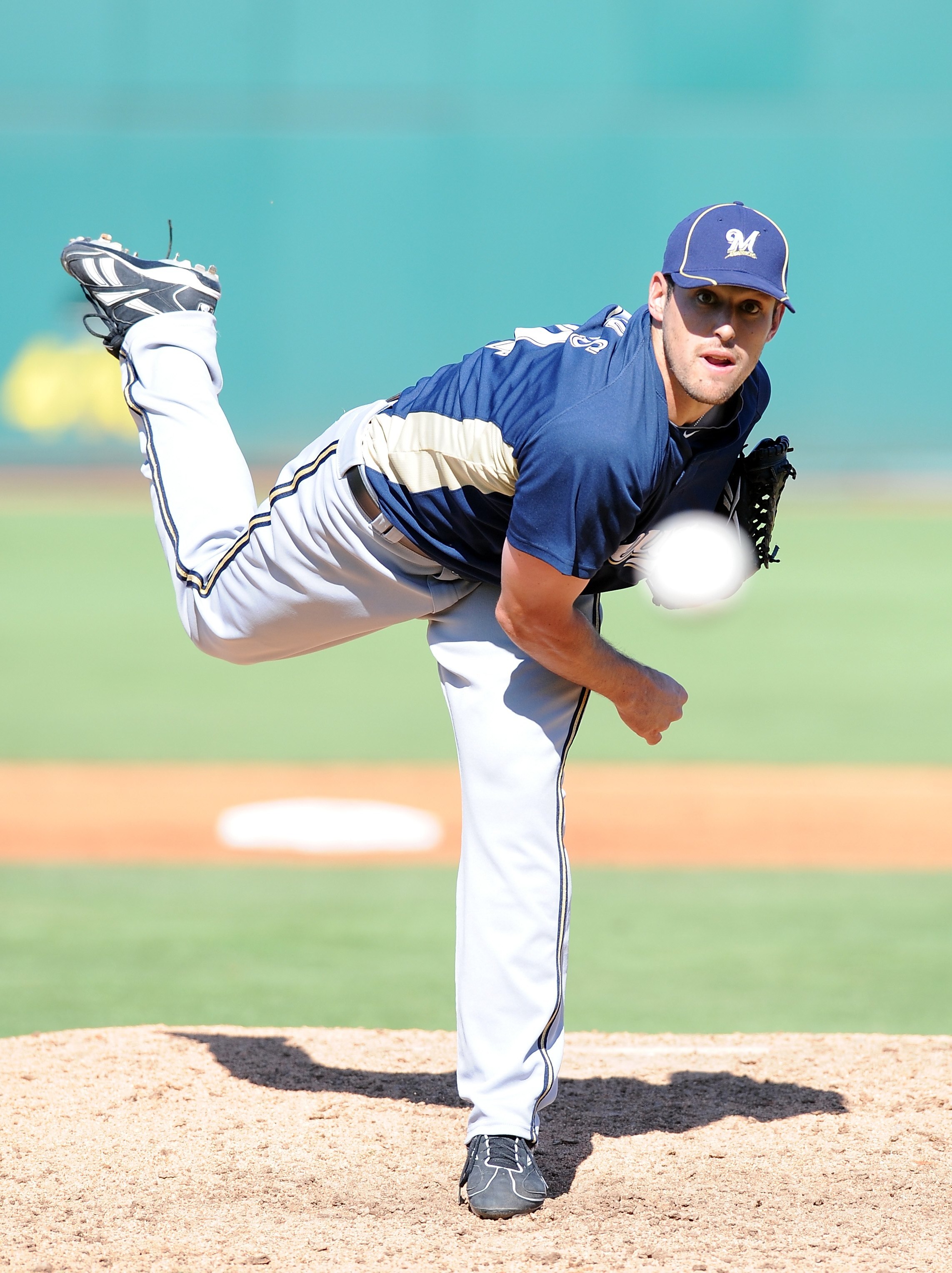 GOODYEAR, AZ - MARCH 11:  Mark Rogers #64 of the Milwaukee Brewers pitches during a Spring Training game against the Cincinnati Reds on March 11, 2010 at Goodyear Ballpark in Goodyear, Arizona.  (Photo by Lisa Blumenfeld/Getty Images)