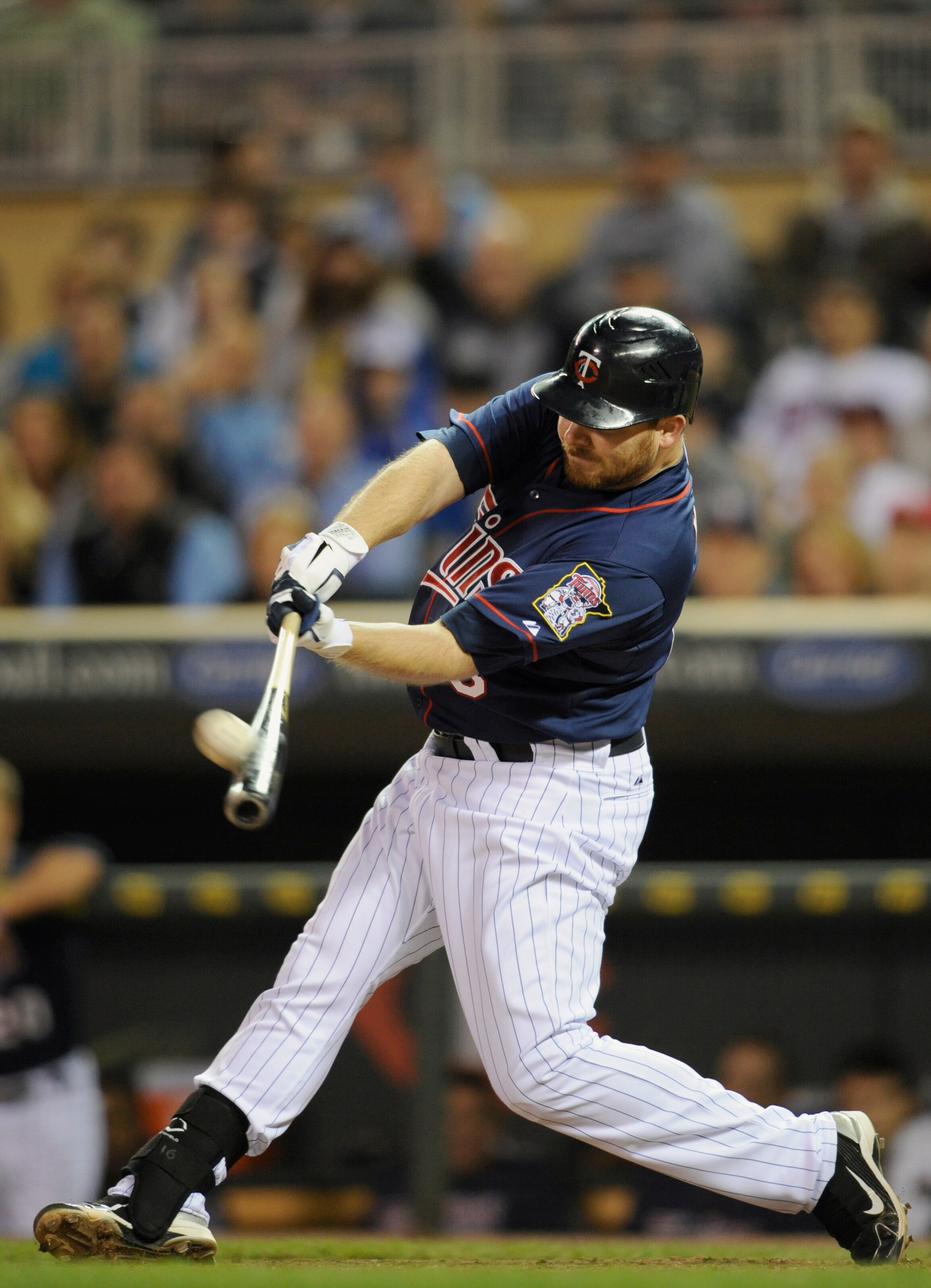 MINNEAPOLIS, MN - APRIL 12: Jason Kubel #16 of the Minnesota Twins his a single off of Robinson Tejeda #51 of the Kansas City Royals in the tenth inning of their game on April 12, 2011 at Target Field in Minneapolis, Minnesota. Twins defeated the Royals 4