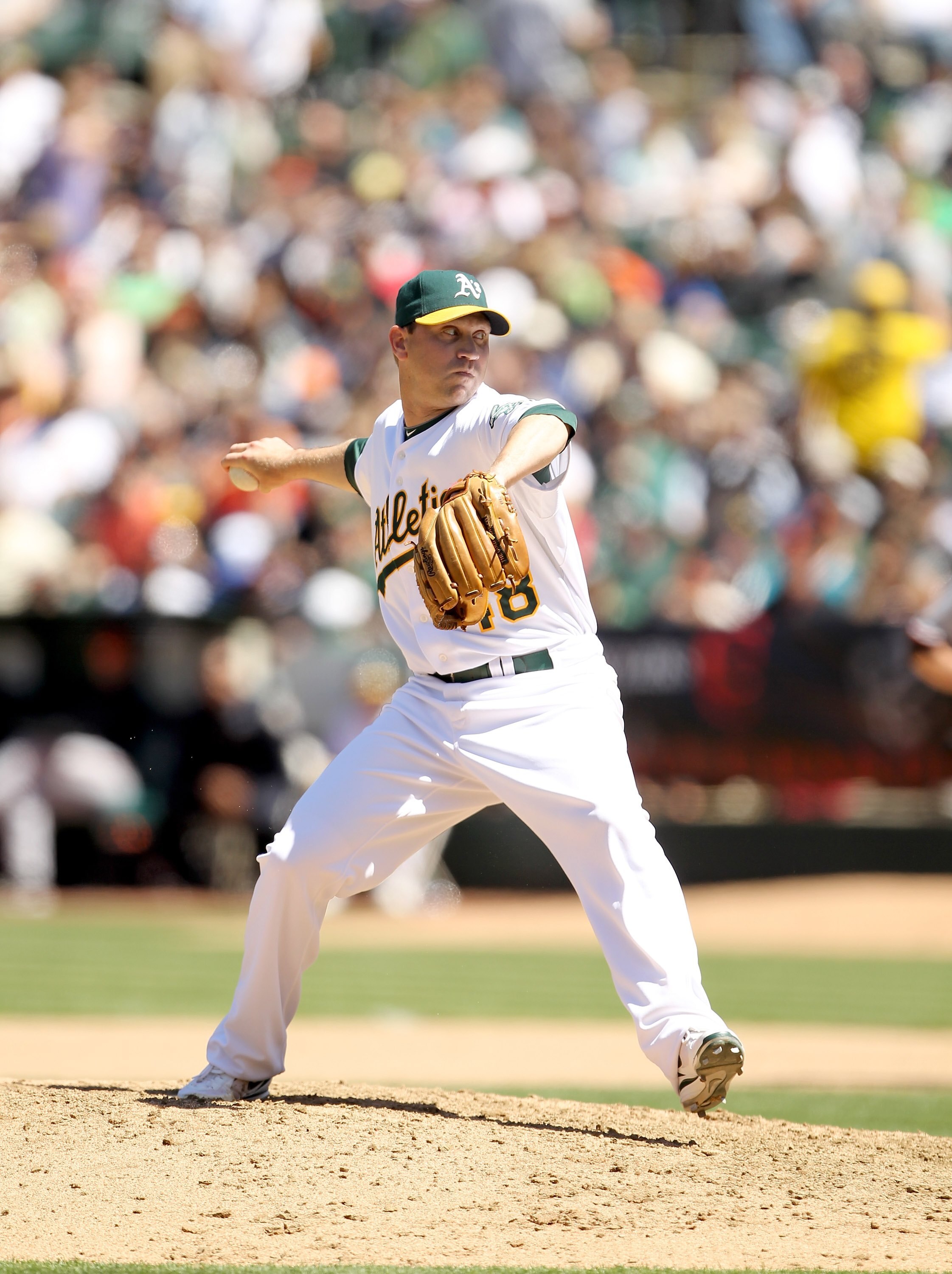 OAKLAND, CA - MAY 23:  Michael Wuertz #48 of the Oakland Athletics pitches against the San Francisco Giants at the Oakland-Alameda County Coliseum on May 23, 2010 in Oakland, California.  (Photo by Ezra Shaw/Getty Images)