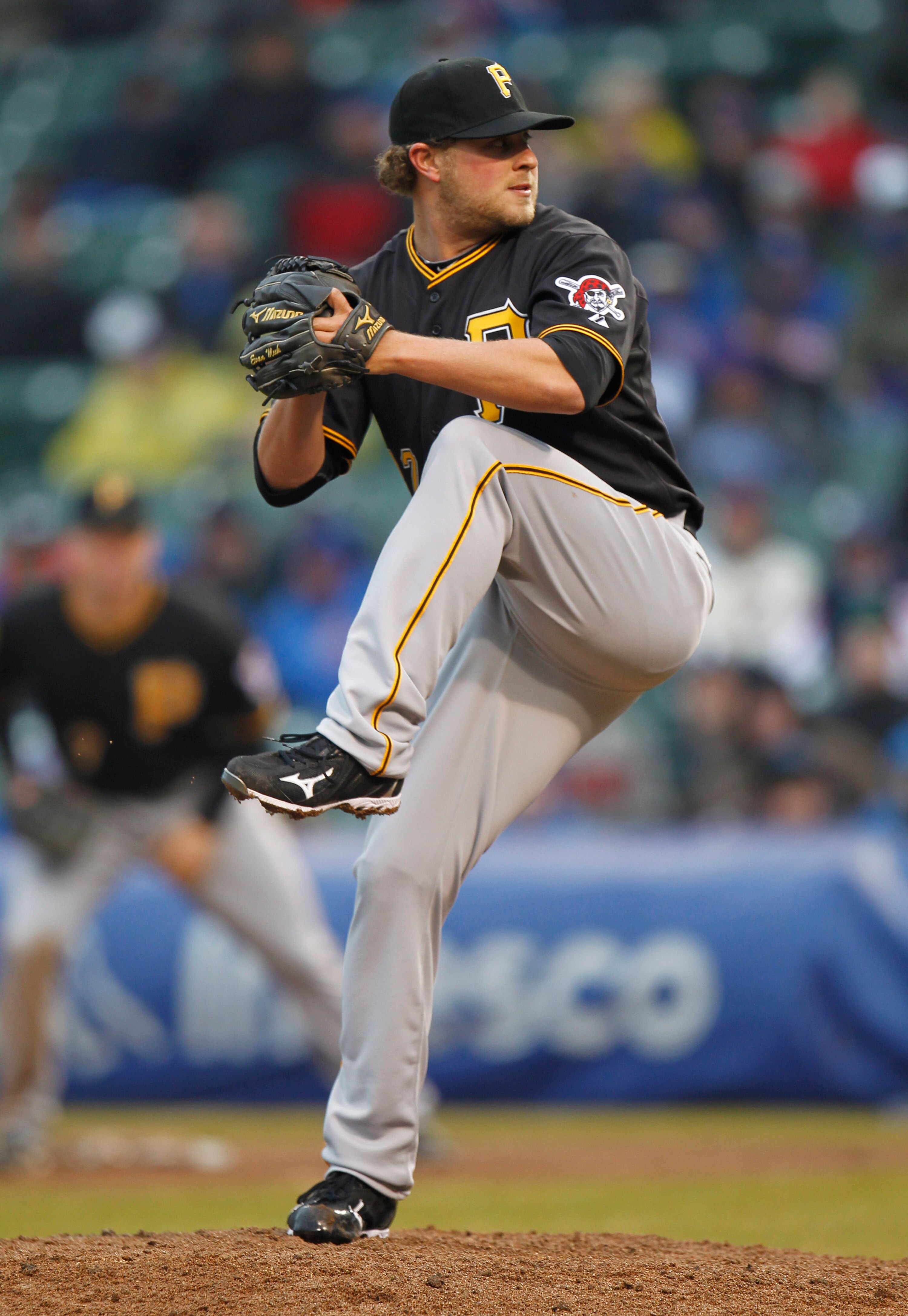 CHICAGO, IL - APRIL 01:  Evan Meek #47 of the Pittsburgh Pirates throws a pitch while playing the Chicago Cubs during opening day at Wrigley Field on April 1, 2011 in Chicago, Illinois.  (Photo by Gregory Shamus/Getty Images)