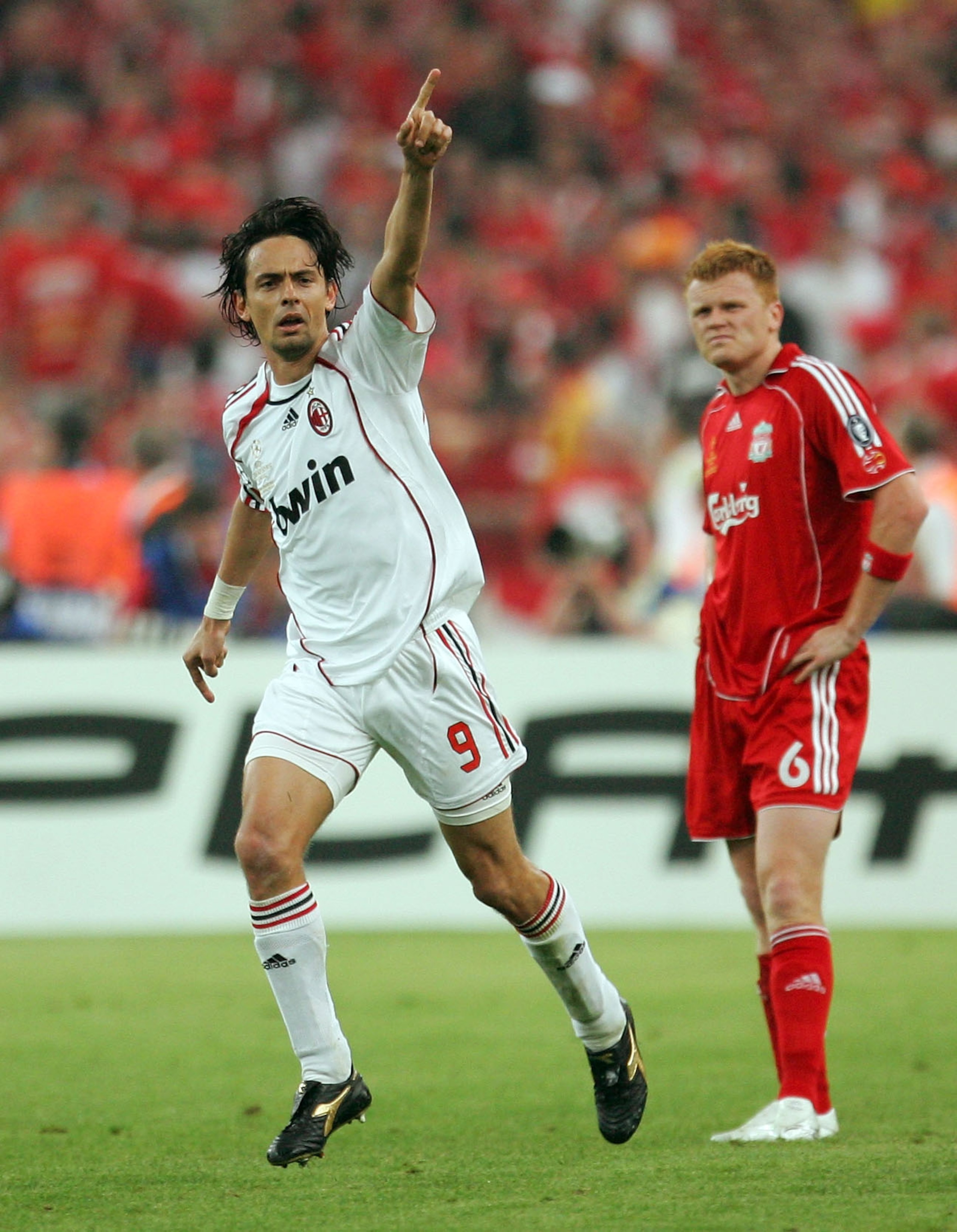 ATHENS, GREECE - MAY 23:  Filippo Inzaghi of Milan celebrates after scoring his teams second goal as John Arne Riise of Liverpool looks on during the UEFA Champions League Final match between Liverpool and AC Milan at the Olympic Stadium on May 23, 2007 i