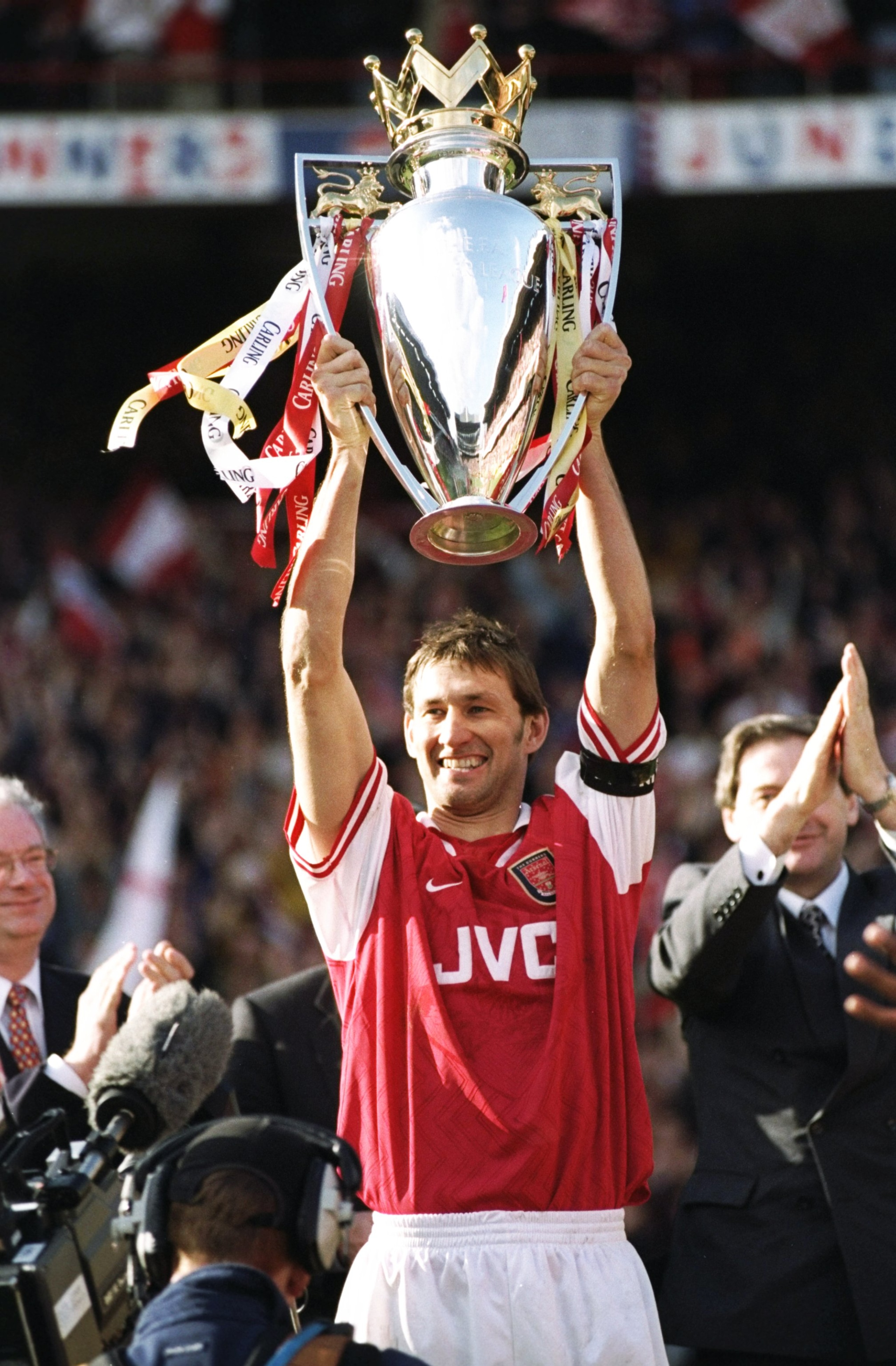 3 May 1998:   Arsenal captain Tony Adams proudly lifts the championship trophy after the FA Carling Premiership match against Everton at Highbury in London. Arsenal won 4-0 to secure the title. \ Mandatory Credit: Shaun Botterill /Allsport