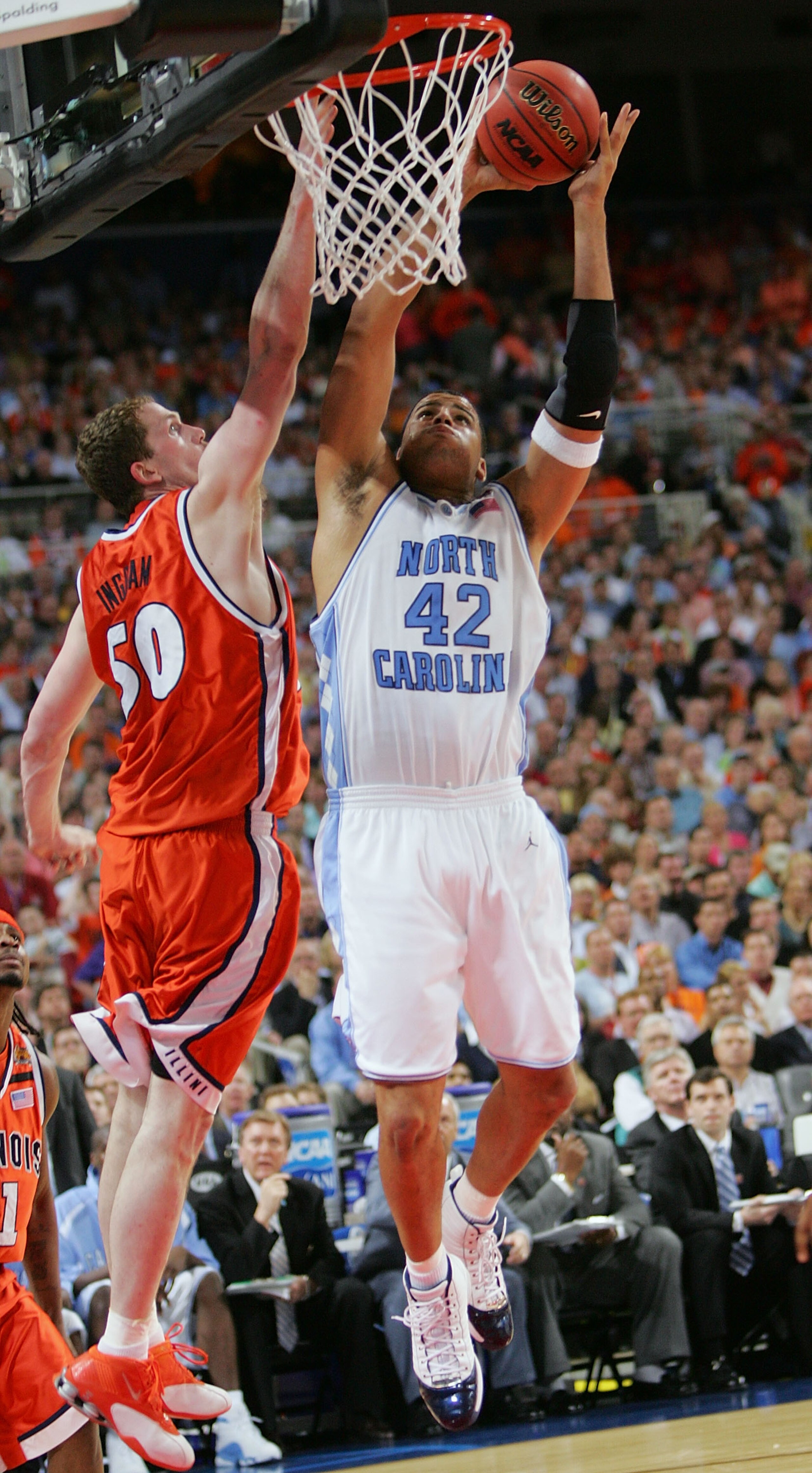 ST. LOUIS - APRIL 04:  Sean May #42 of the North Carolina Tar Heels attempts a slam dunk against Jack Ingram #50 of the Illinois Fighting Illini during the NCAA Men's National Championship game at the Edward Jones Dome on April 4, 2005 in St. Louis, Misso