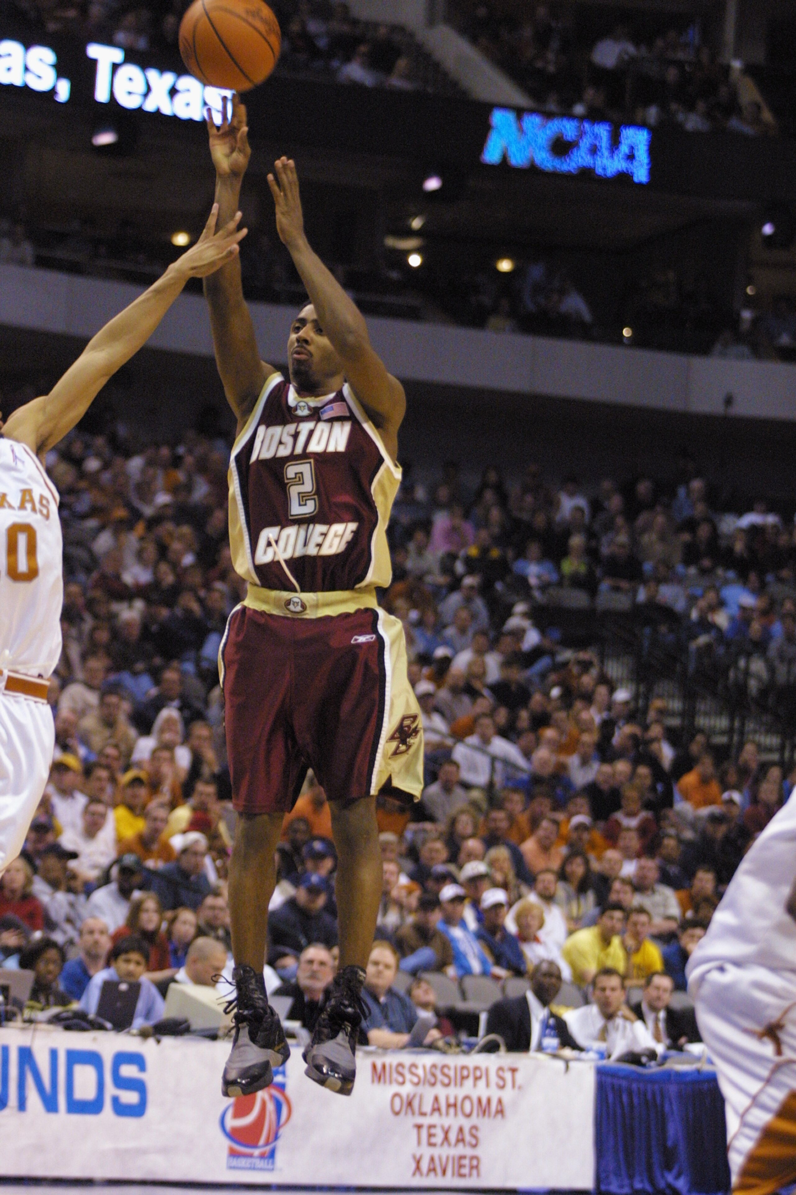 DALLAS - MARCH 15:  Guard Troy Bell #2 of the Boston College Eagles shoots the ball over center James Thomas #0 of the Texas Longhorns during the first round game of the 2002 NCAA Division I Men's Basketball Championship at American Airlines Arena in Dall