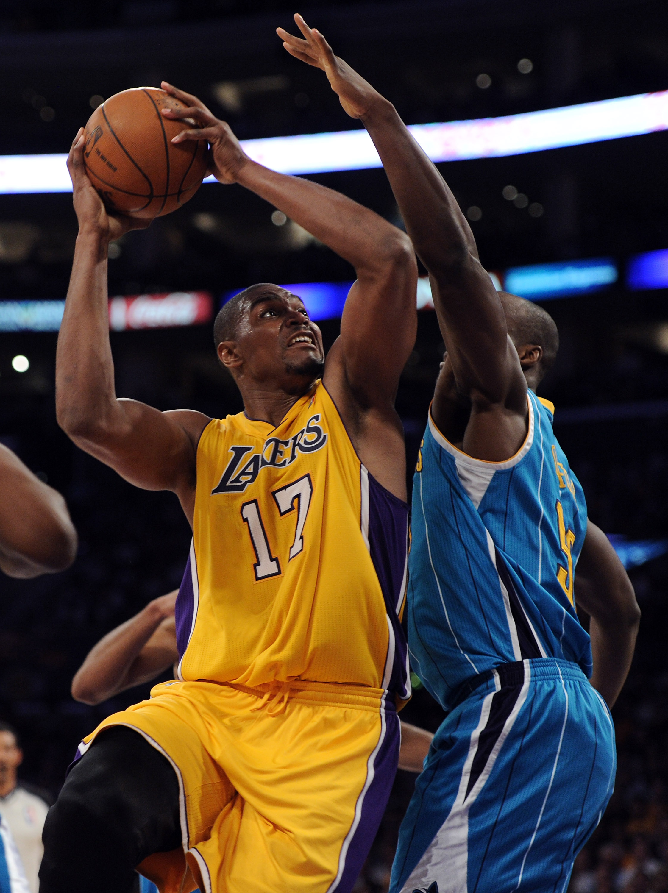 LOS ANGELES, CA - APRIL 20:  Andrew Bynum #17 of the Los Angeles Lakers goes up for a shot against Emeka Okafor #50 of the New Orleans Hornets in Game Two of the Western Conference Quarterfinals in the 2011 NBA Playoffs on April 20, 2011 at Staples Center