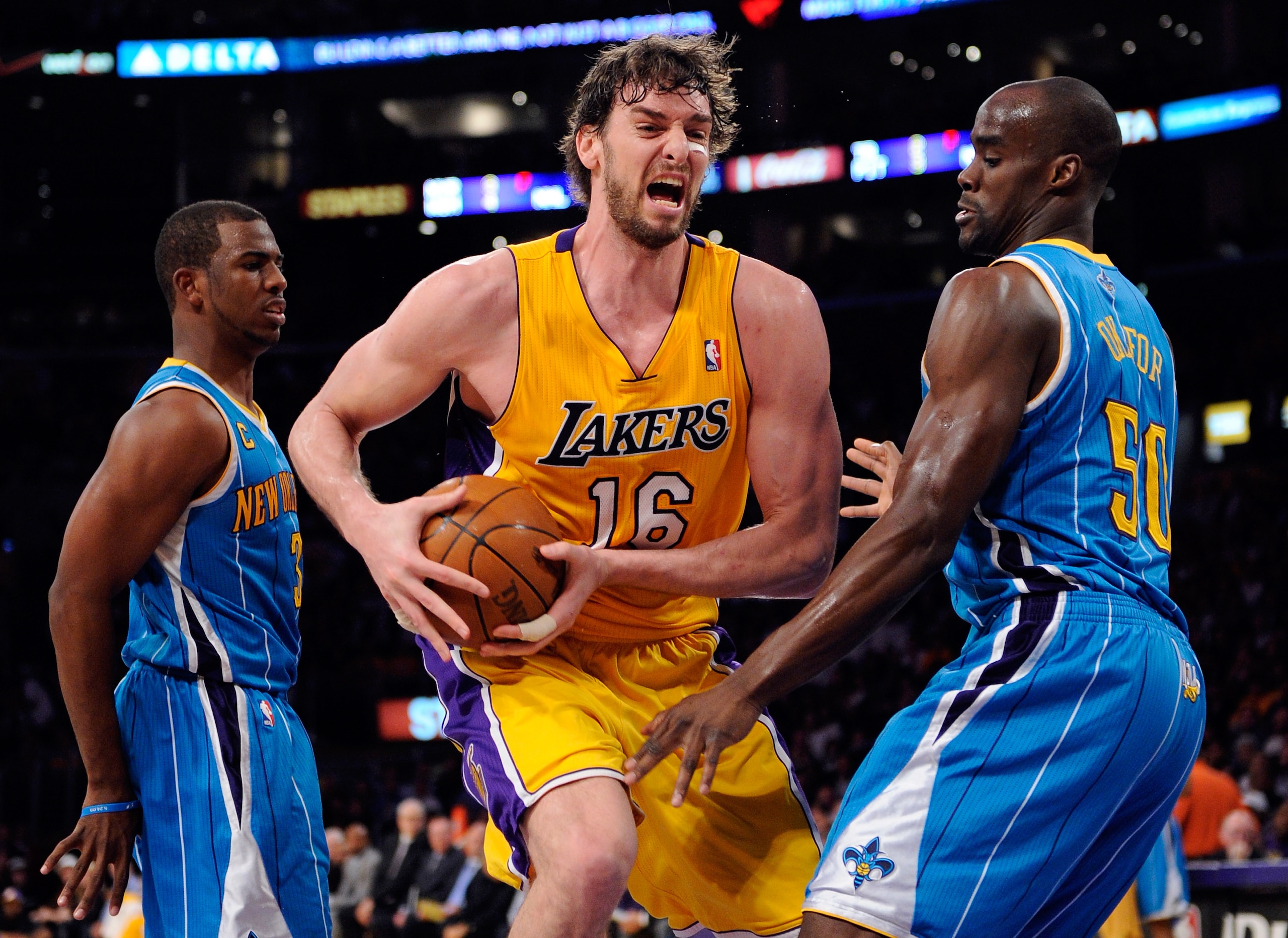 LOS ANGELES, CA - APRIL 20:  Pau Gasol #16 of the Los Angeles Lakers goes up for a shot against Emeka Okafor #50 of the New Orleans Hornets in Game Two of the Western Conference Quarterfinals in the 2011 NBA Playoffs on April 20, 2011 at Staples Center in