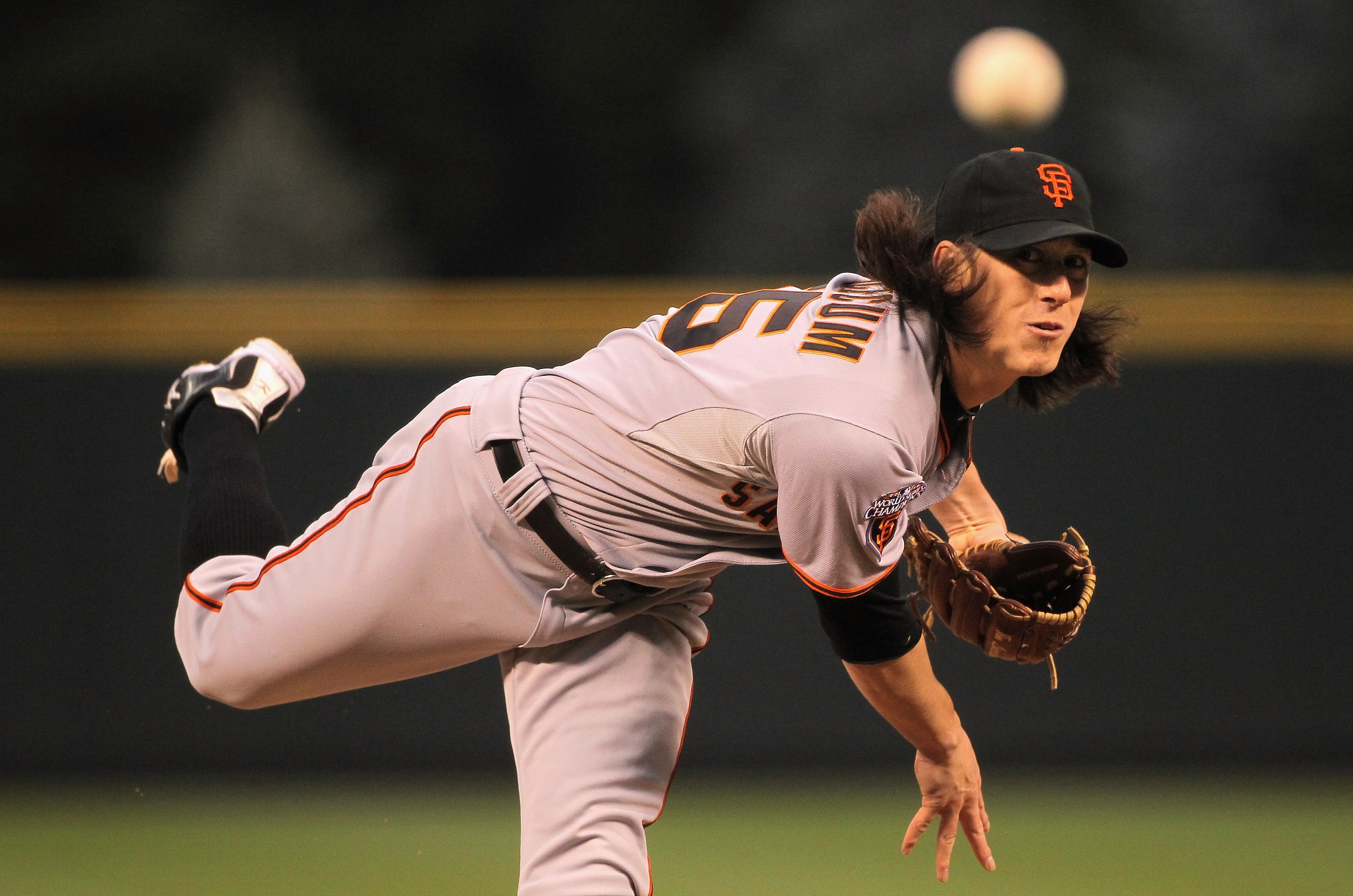 DENVER, CO - APRIL 18:  Starting pitcher Tim Lincecum #55 of the San Francisco Giants delivers against the Colorado Rockies at Coors Field on April 18, 2011 in Denver, Colorado.  (Photo by Doug Pensinger/Getty Images)