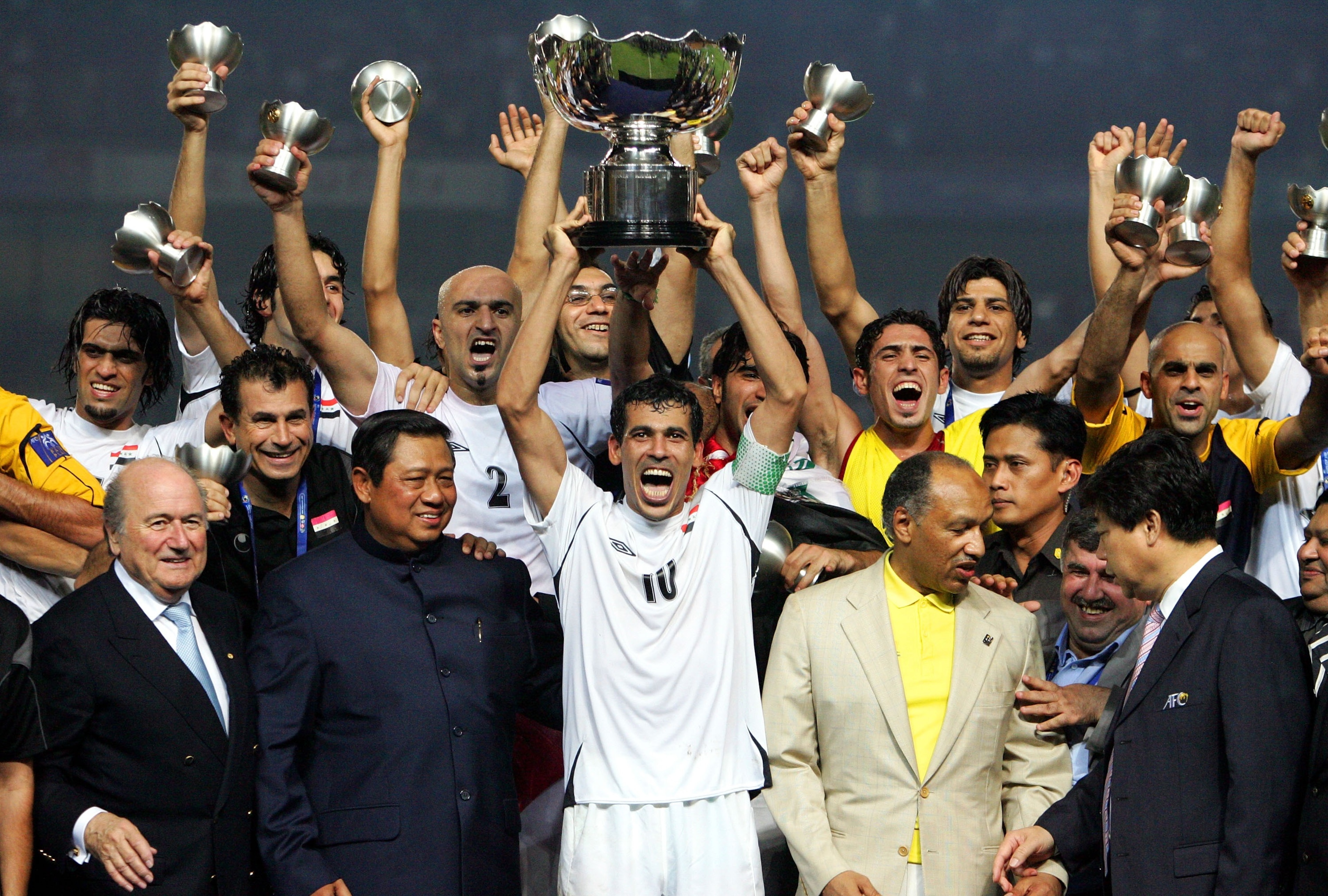 JAKARTA, INDONESIA - JULY 29: Younis Mahmoud of Iraq celebrates winning the AFC Asian Cup 2007 final against Saudi Arabia with his team mates, at Gelora Bung Karno Stadium july 29, 2007 in Jakarta, Indonesia. (Photo by Koji Watanabe/Getty Images) JAKARTA, INDONESIA - JULY 29: Younis Mahmoud of Iraq celebrates winning the AFC Asian Cup 2007 final against Saudi Arabia with his team mates, at Gelora Bung Karno Stadium july 29, 2007 in Jakarta, Indonesia. (Photo by Koji Watanabe/Getty Images)