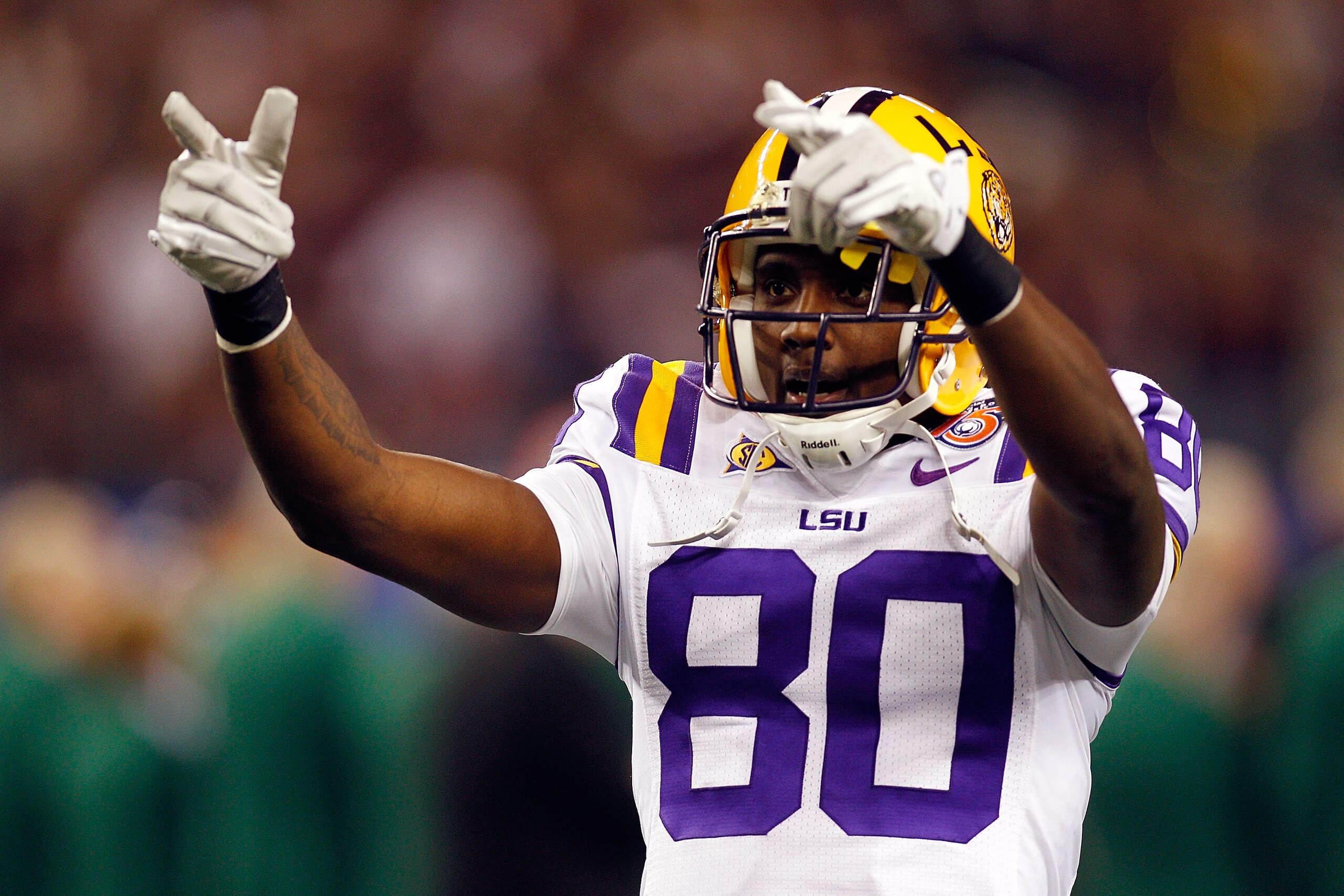 ARLINGTON, TX - JANUARY 07:  Terrence Toliver #80 of the Louisiana State University Tigers points to the crowd during pregame before playing the Texas A&M Aggies during the AT&T Cotton Bowl at Cowboys Stadium on January 7, 2011 in Arlington, Texas.  (Phot