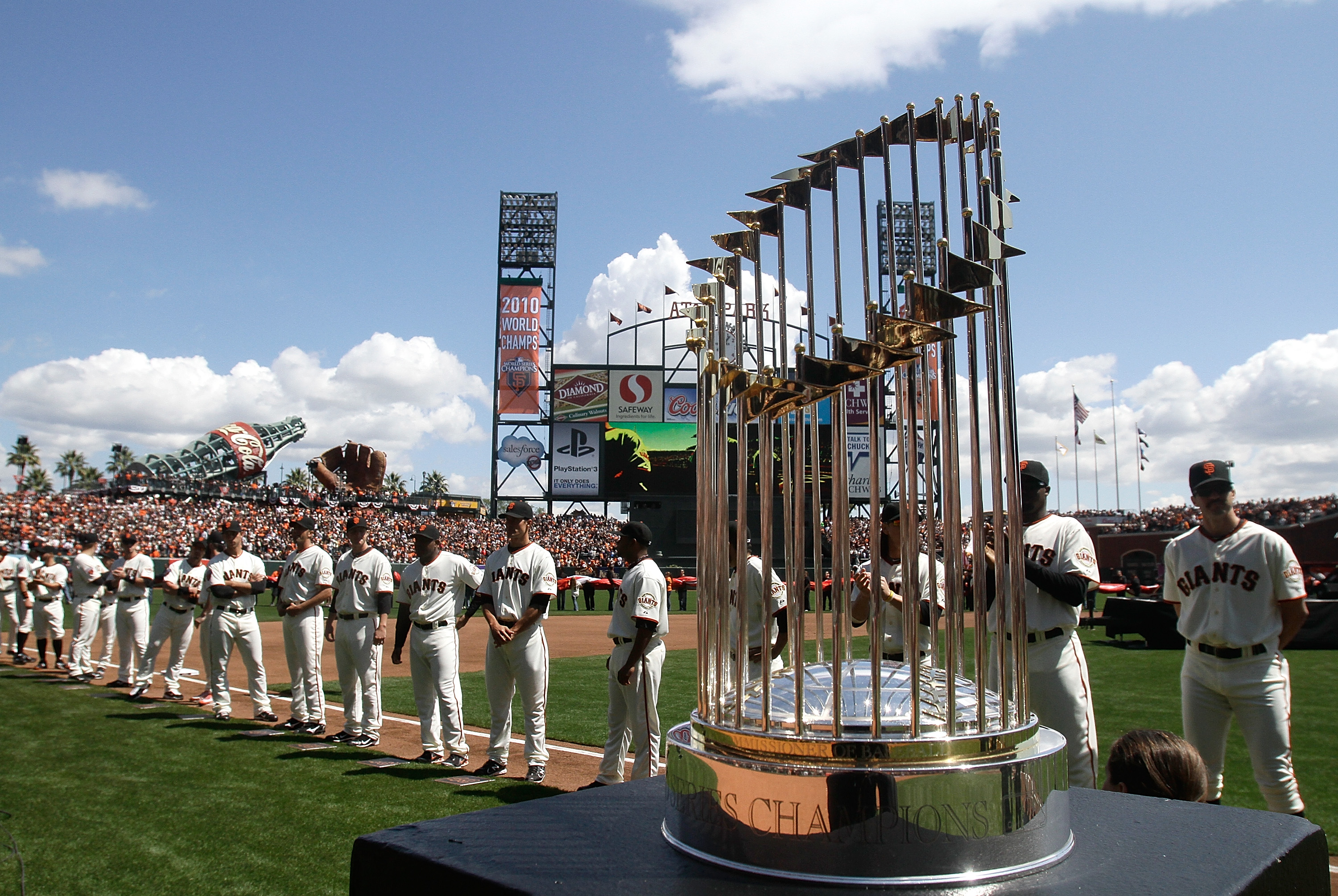 SAN FRANCISCO, CA - APRIL 08:  The 2010 World Series trophy is displayed as San Francisco Giants players line up before the start of the Giants' opening day game against the St. Louis Cardinals at AT&T Park on April 8, 2011 in San Francisco, California.