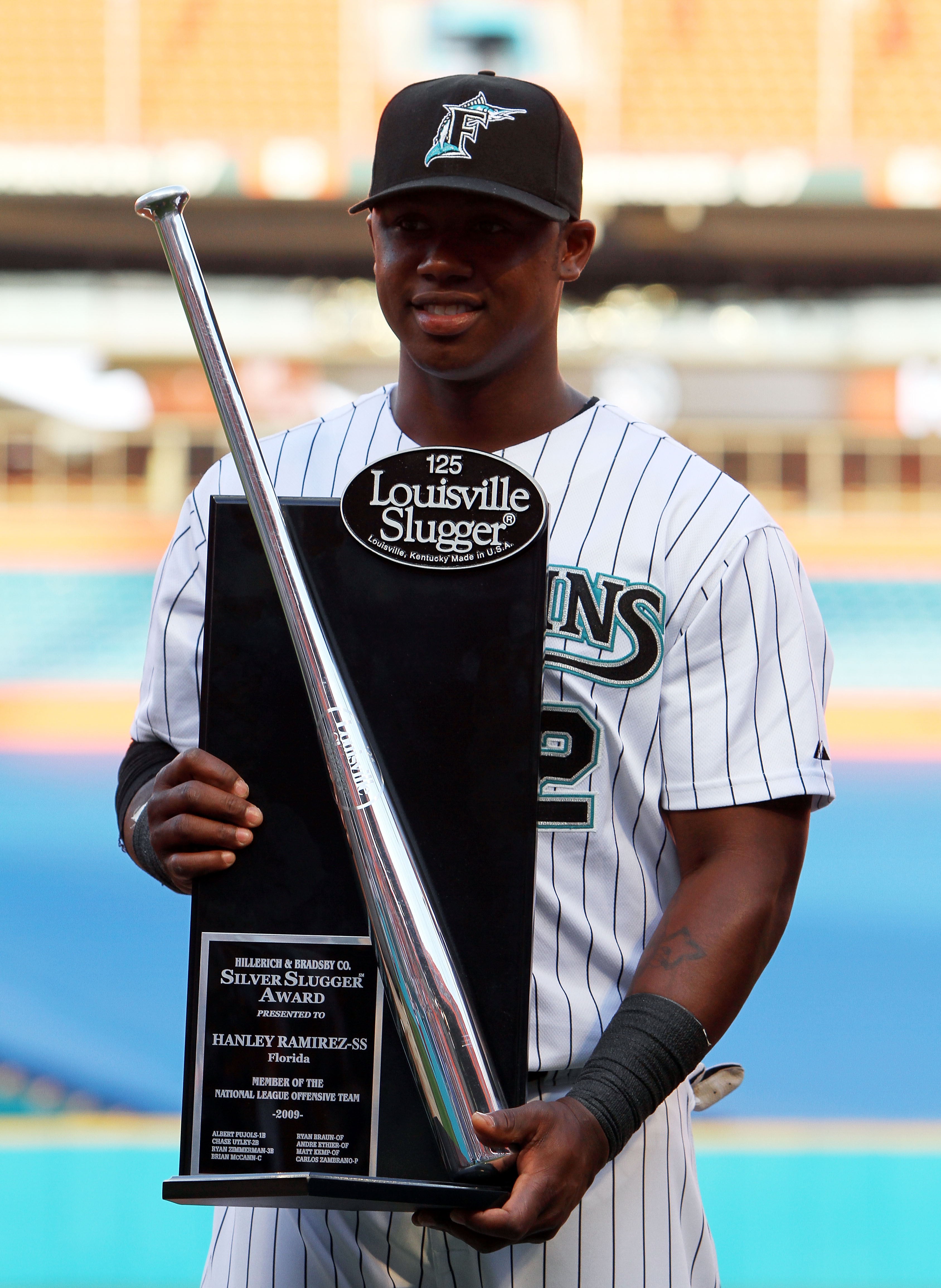 MIAMI - APRIL 09:  Hanley Ramirez #2 of the Florida Marlins accepts his 2009 Louisville Slugger Silver Slugger Award before taking on the Los Angeles Dodgers during the Marlins home opening game at Sun Life Stadium on April 9, 2010 in Miami, Florida.  (Ph