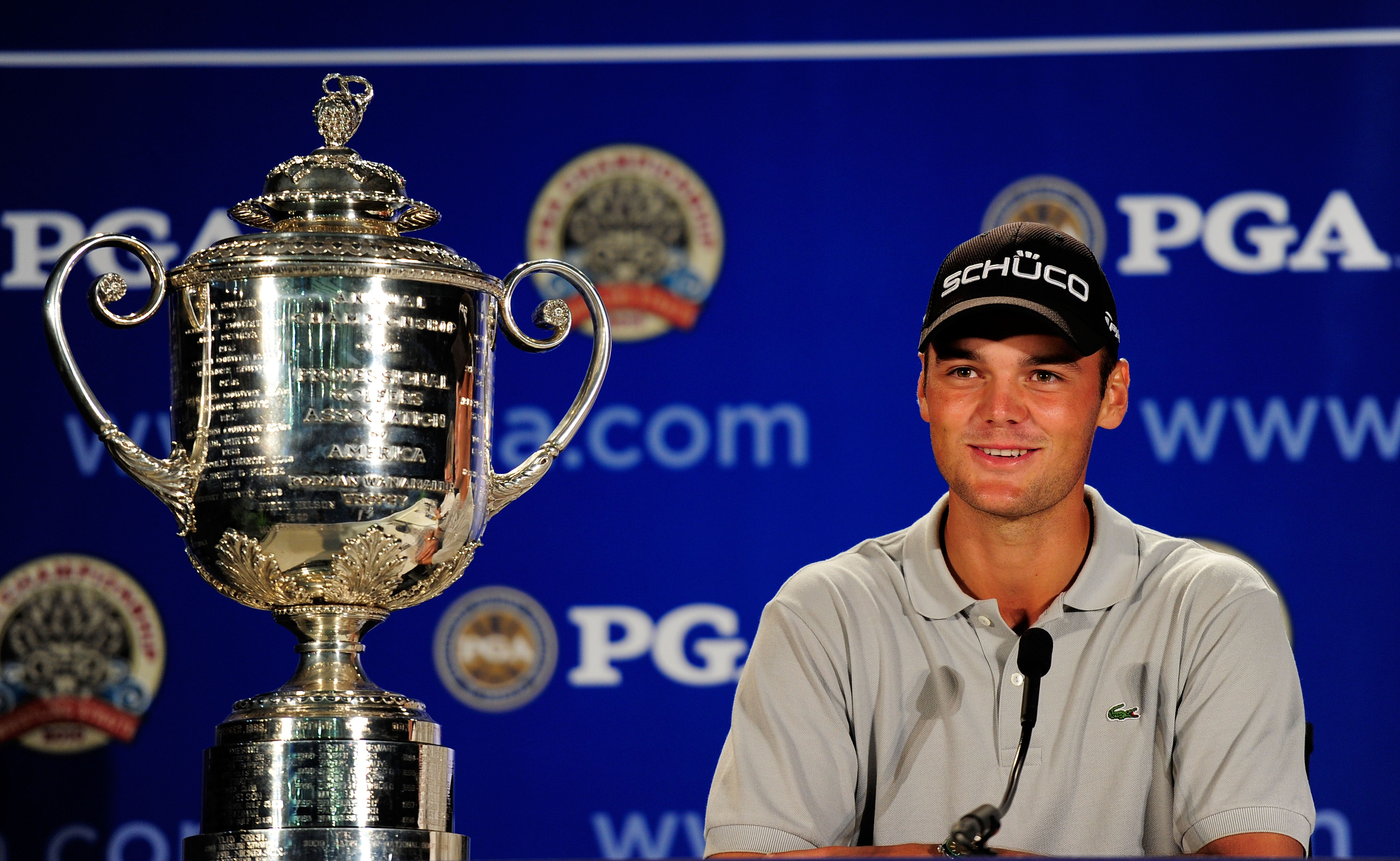 KOHLER, WI - AUGUST 15:  Martin Kaymer of Germany sits next to the Wanamaker Trophy while he is interviewed during a press conference after winning the 92nd PGA Championship on the Straits Course at Whistling Straits on August 15, 2010 in Kohler, Wisconsi