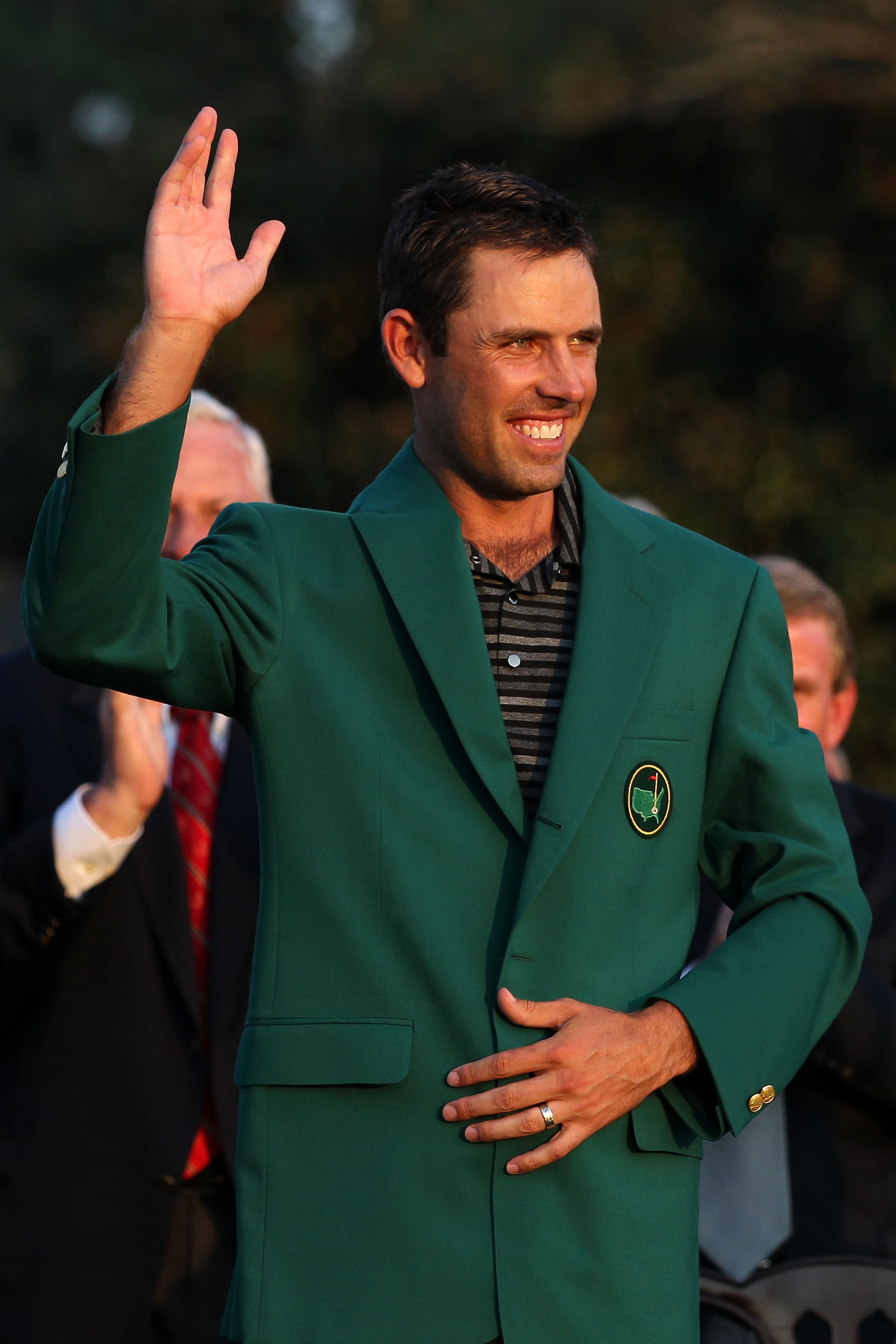 AUGUSTA, GA - APRIL 10:  Charl Schwartzel of South Africa waves to the gallery at the green jacket presentation after his two-stroke victory at the 2011 Masters Tournament at Augusta National Golf Club on April 10, 2011 in Augusta, Georgia.  (Photo by And