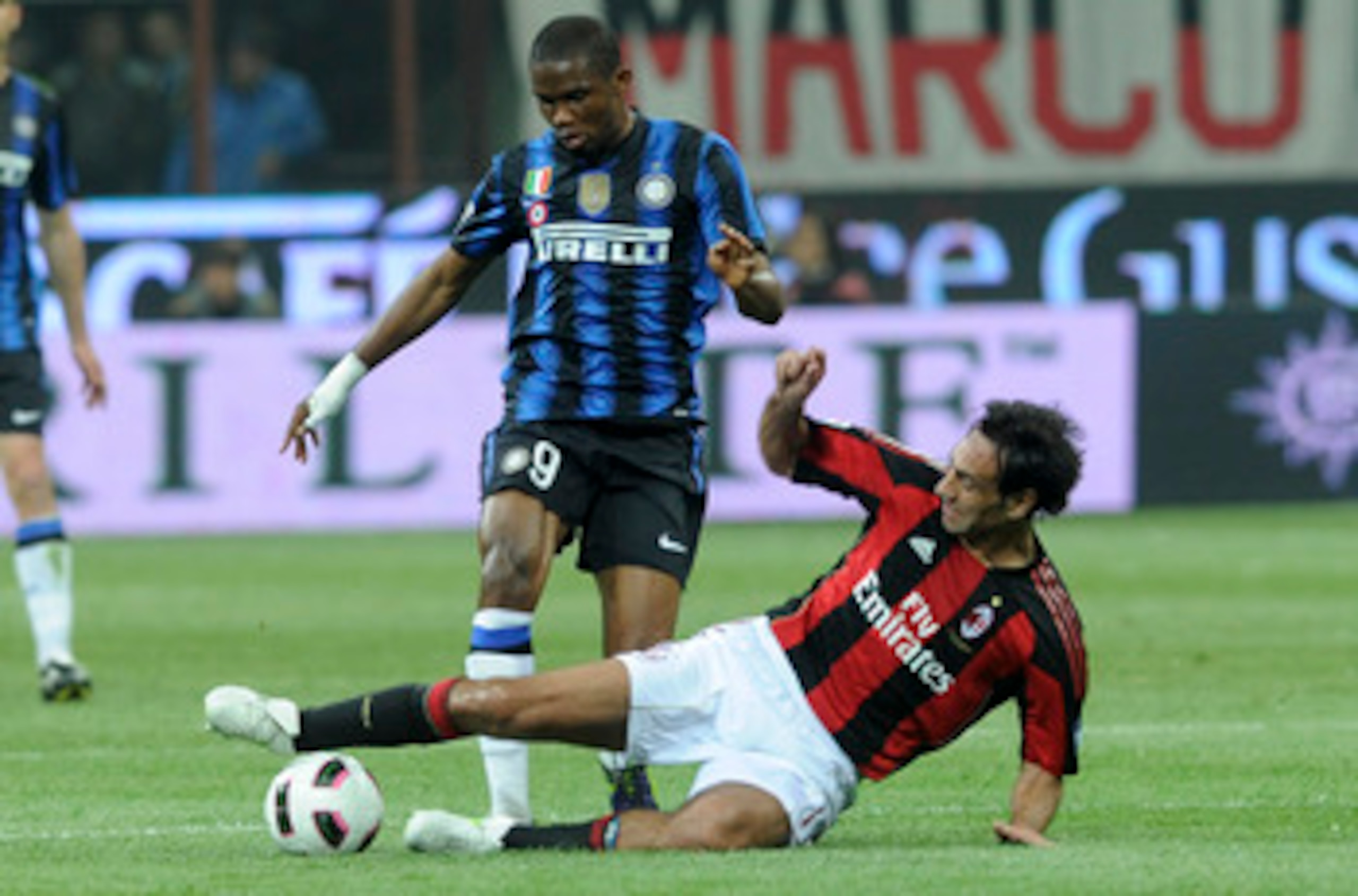 MILAN, ITALY - APRIL 02:  (L - R) Samuel Eto'o of FC Inter competes with Alessandro Nesta of AC Milan during the Serie A match between AC Milan and FC Internazionale Milano at Stadio Giuseppe Meazza on April 2, 2011 in Milan, Italy.  (Photo by Dino Panato