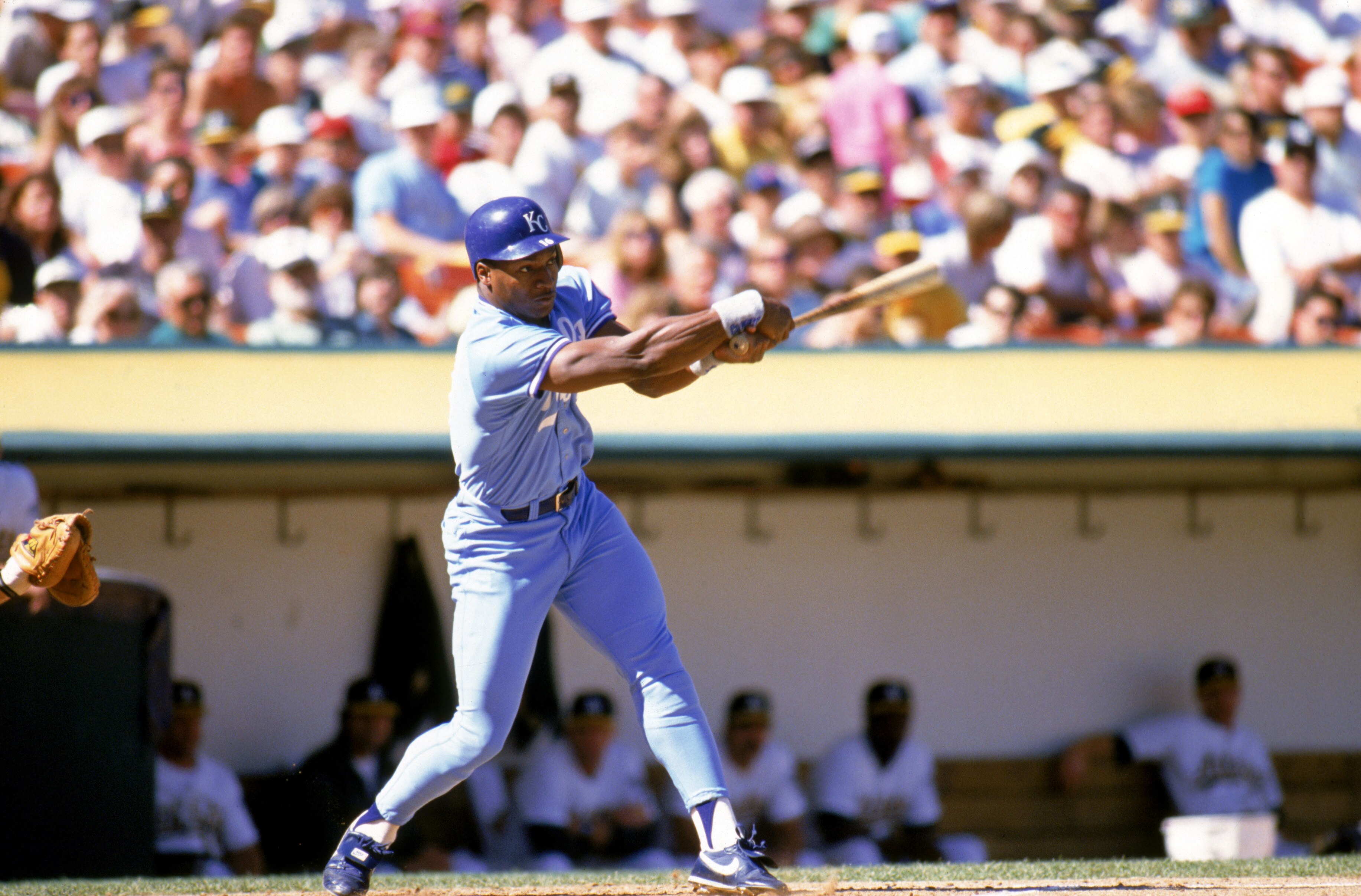 OAKLAND, CA -1989:  Bo Jackson #16 of the Kansas City Royals follows through on his swing during a game against the Oakland Athletics at Oakland-Alameda County Coliseum in 1989 in Oakland, California.  (Photo by Otto Greule Jr/Getty Images)