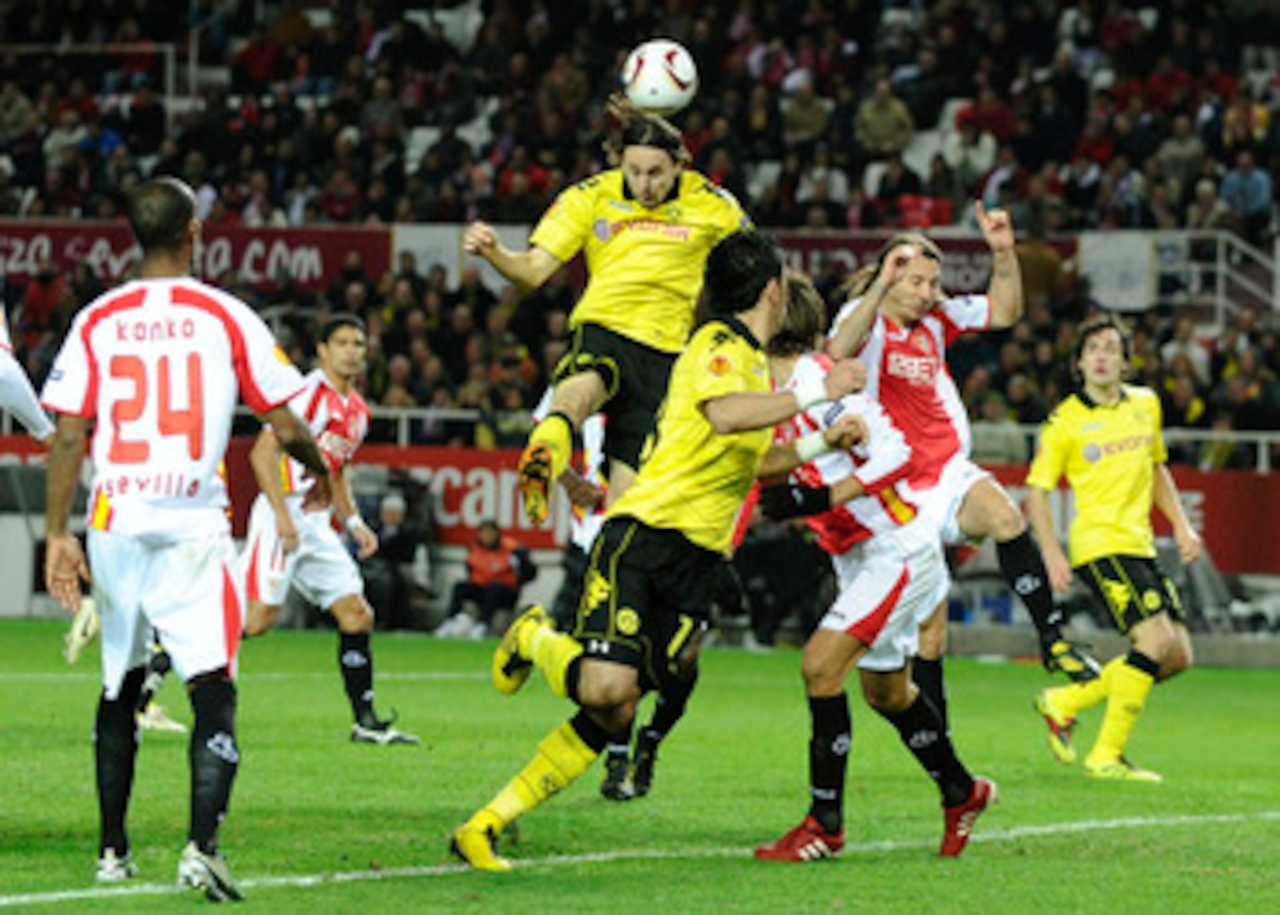 SEVILLE, SPAIN - DECEMBER 15:  Neven Subotic of Borussia Dortmund (C) scores his team's second goal during the UEFA Europa League group J match between Sevilla and Borussia Dortmund at Estadio Ramon Sanchez Pizjuan on December 15, 2010 in Seville, Spain. 